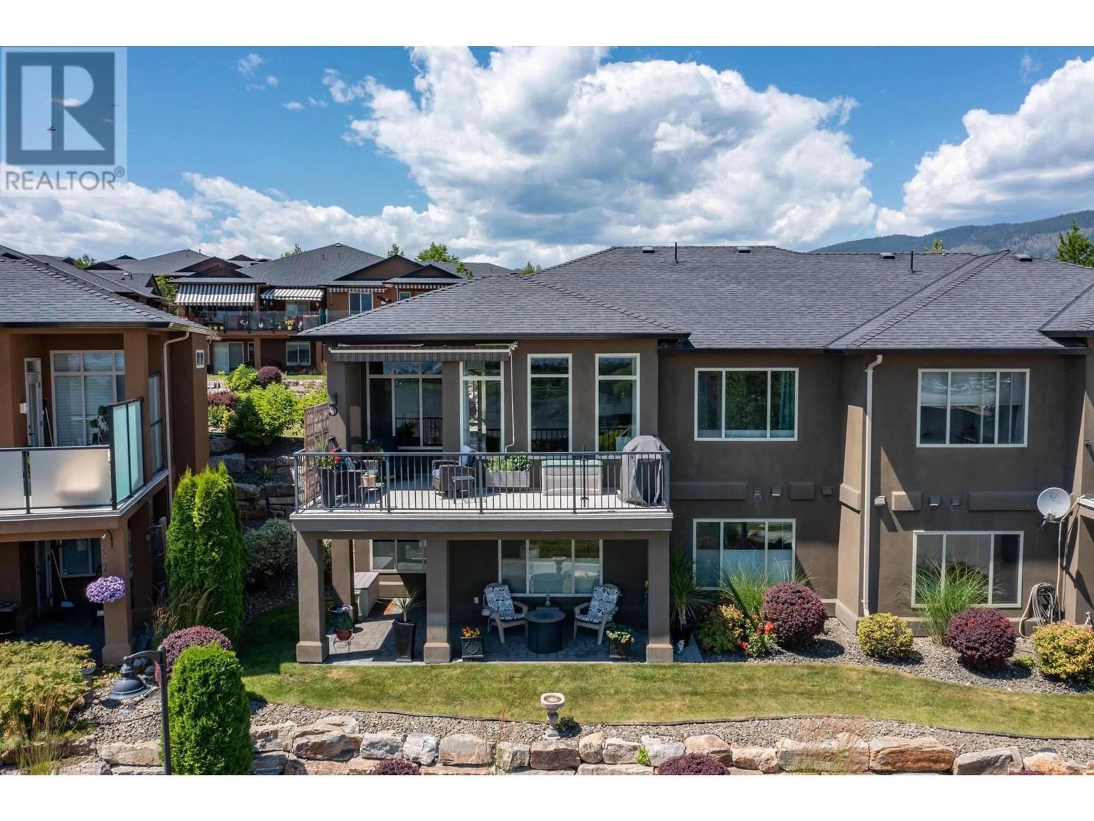 A pic from outside/outdoor area/front of a property/back of a property/a pic from drone, mountain view for 2123 Madera Court, West Kelowna British Columbia V4T3H7