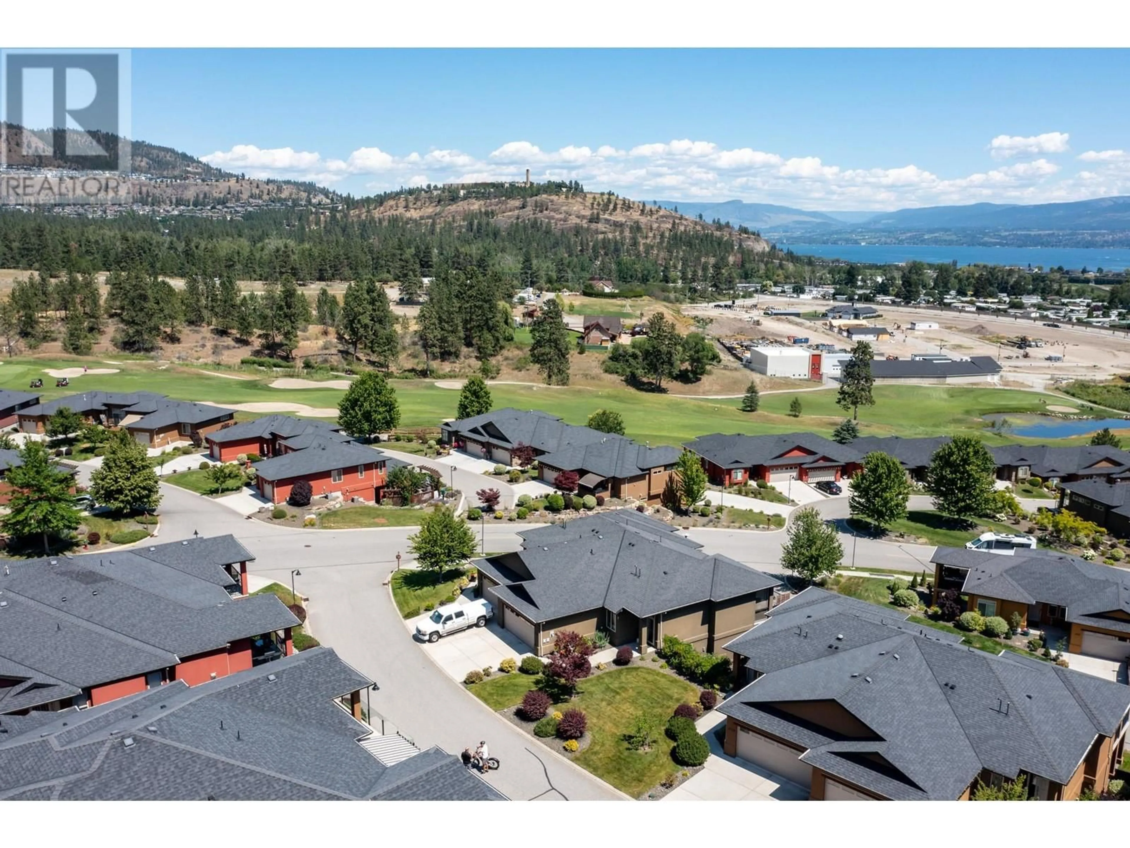 A pic from outside/outdoor area/front of a property/back of a property/a pic from drone, mountain view for 2123 Madera Court, West Kelowna British Columbia V4T3H7