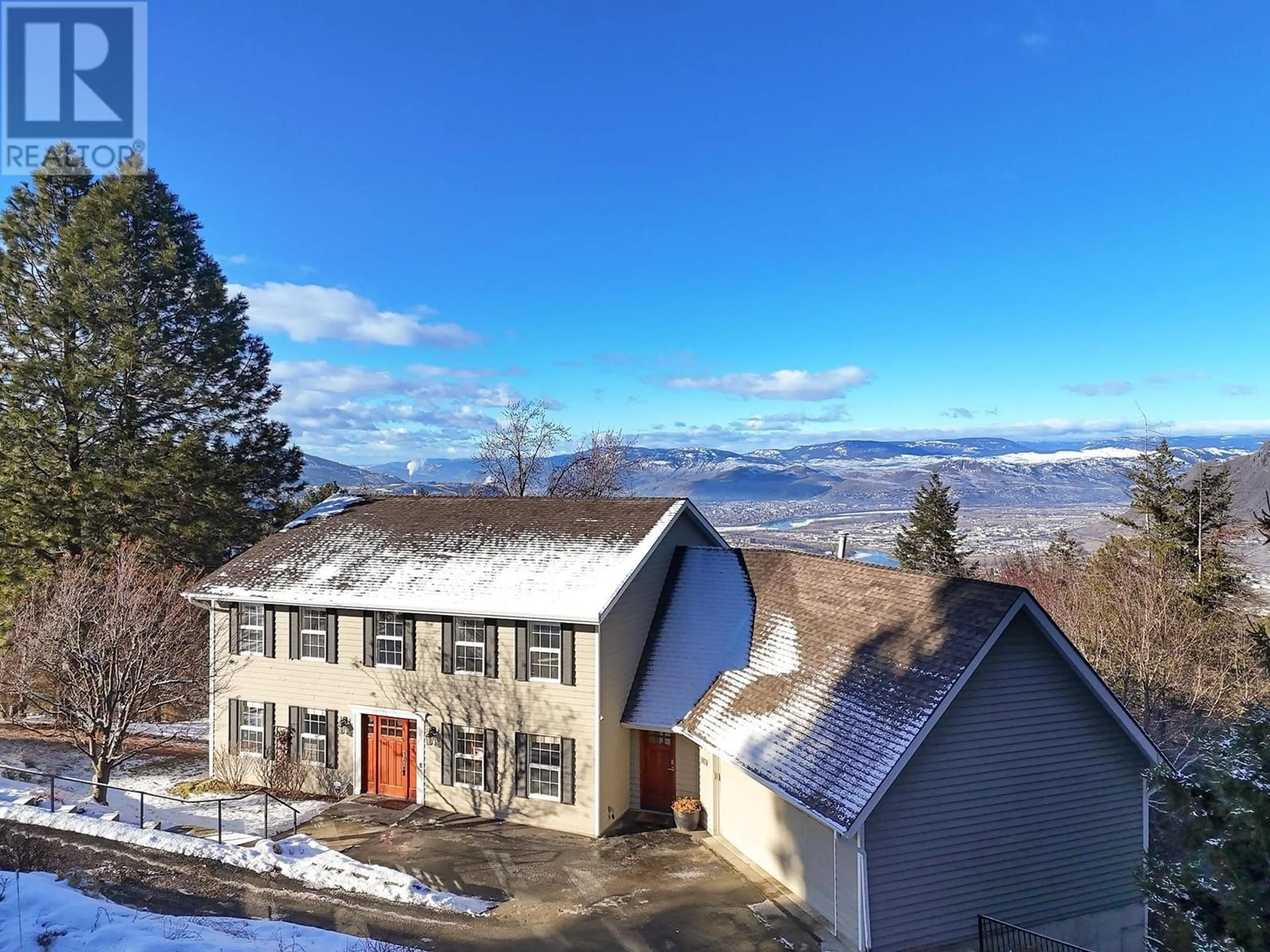 A pic from outside/outdoor area/front of a property/back of a property/a pic from drone, mountain view for 1978 HIGH SCHYLEA Drive, Kamloops British Columbia V2E1K9