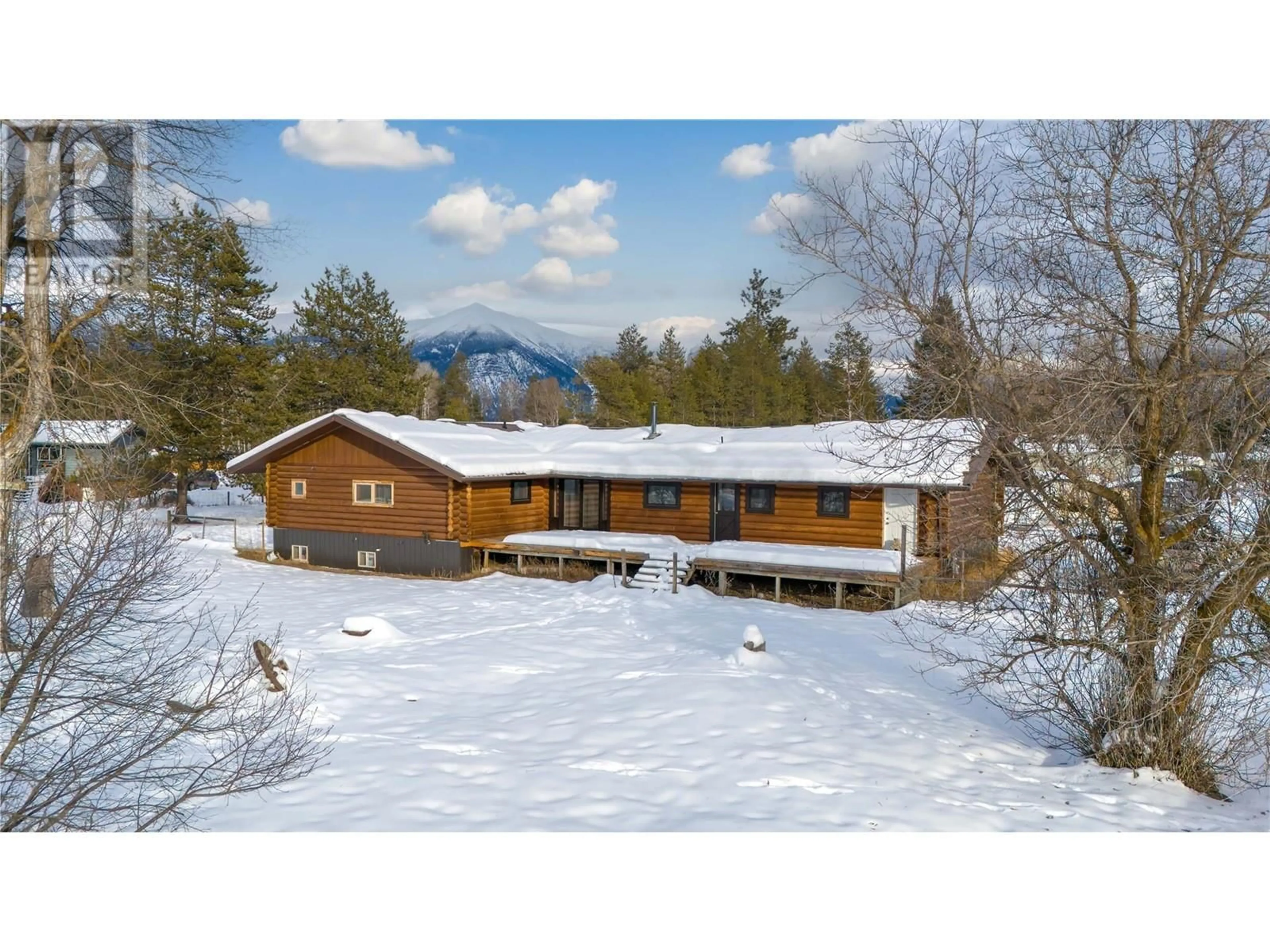 A pic from outside/outdoor area/front of a property/back of a property/a pic from drone, mountain view for 7309 BERTRAND Road, Jaffray British Columbia V0B1T0