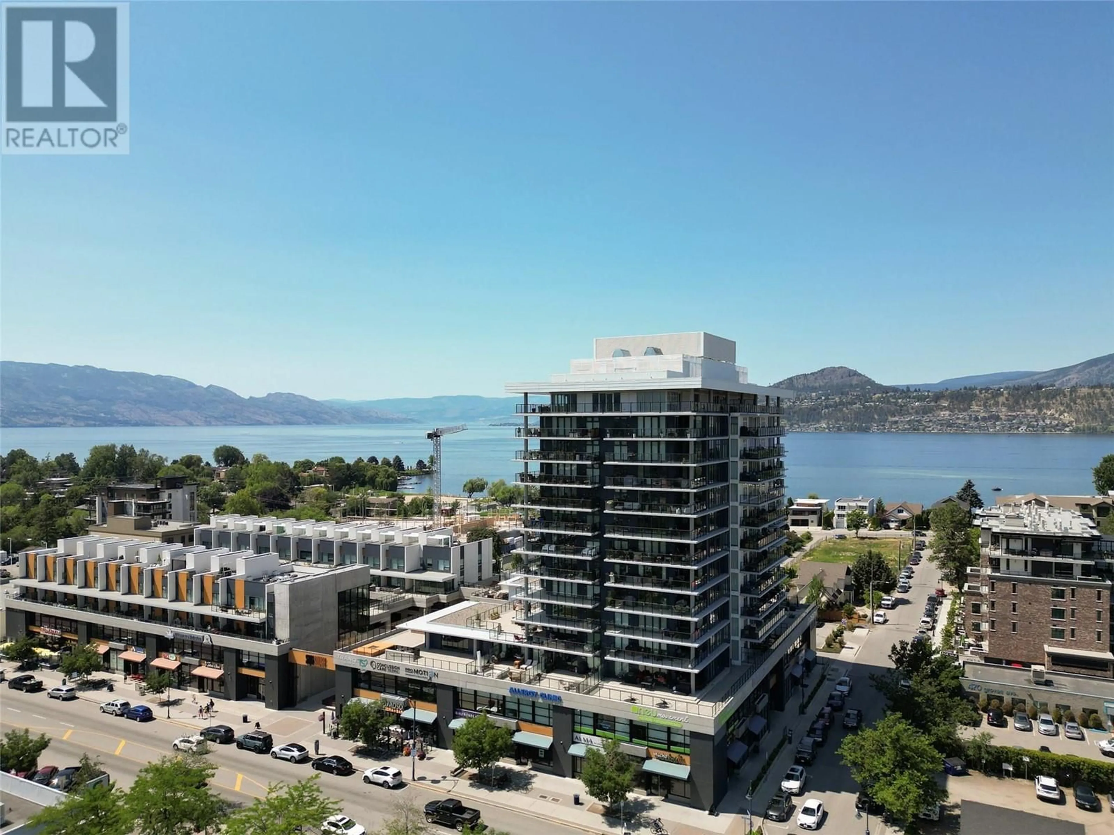 A pic from outside/outdoor area/front of a property/back of a property/a pic from drone, water/lake/river/ocean view for 485 Groves Avenue Unit# 502, Kelowna British Columbia V1Y4Y6