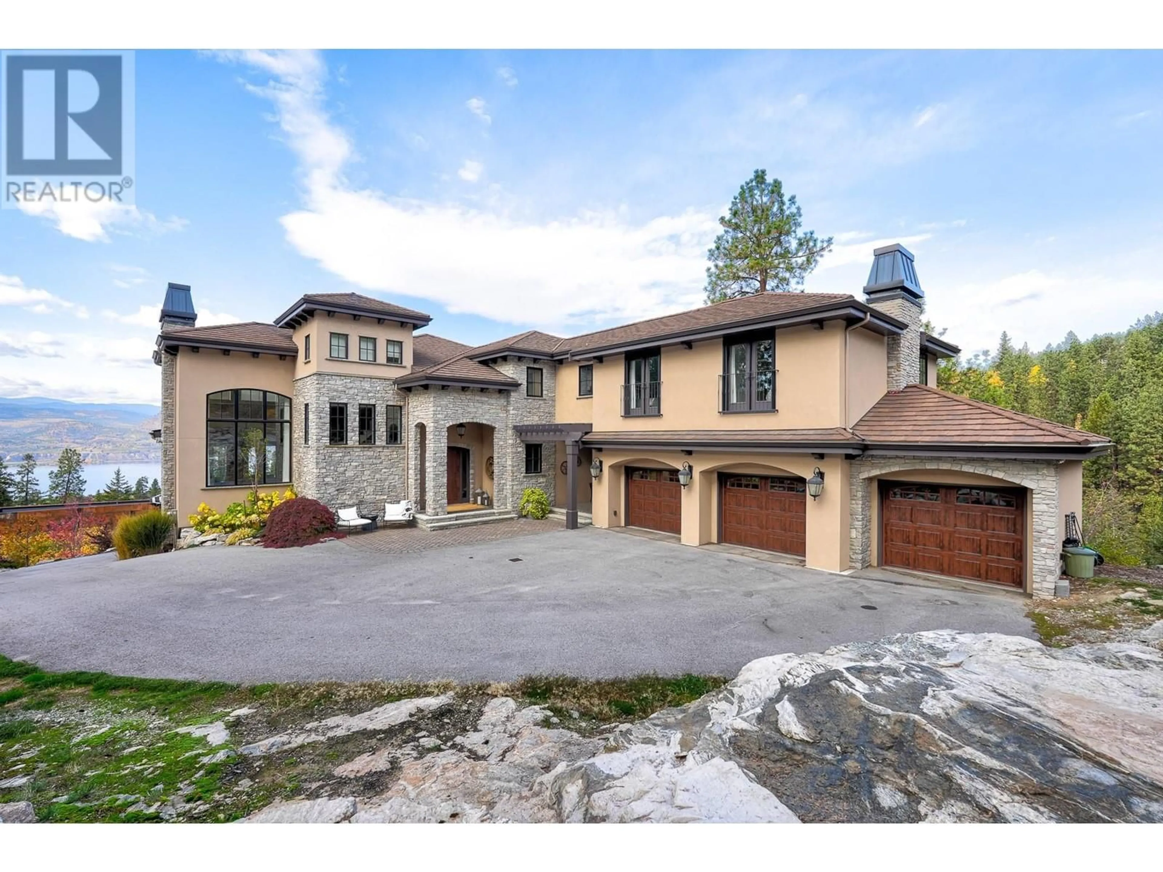 Home with brick exterior material, mountain view for 130 Slate Place, Naramata British Columbia V0H1N1