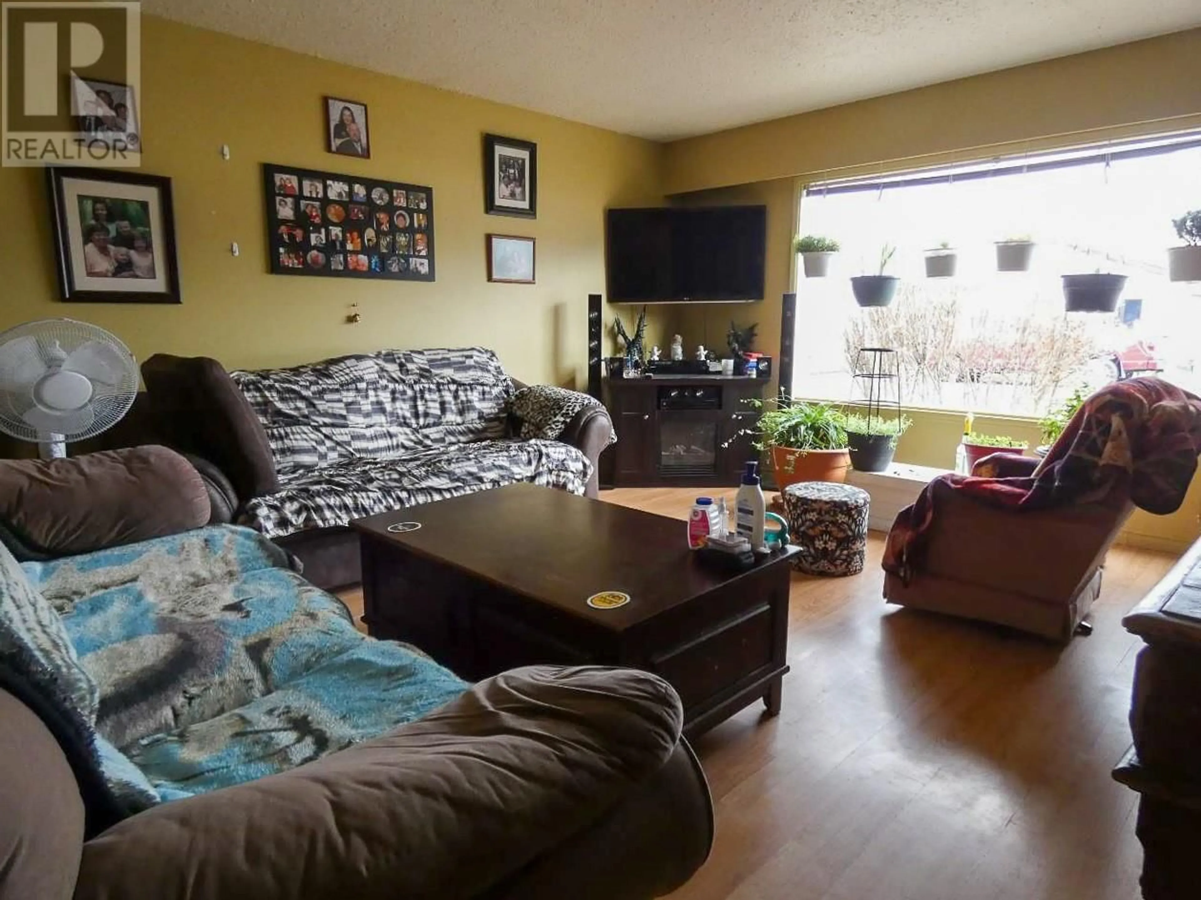 Living room with furniture, unknown for 1881 MAY Street, Merritt British Columbia V1K1B8