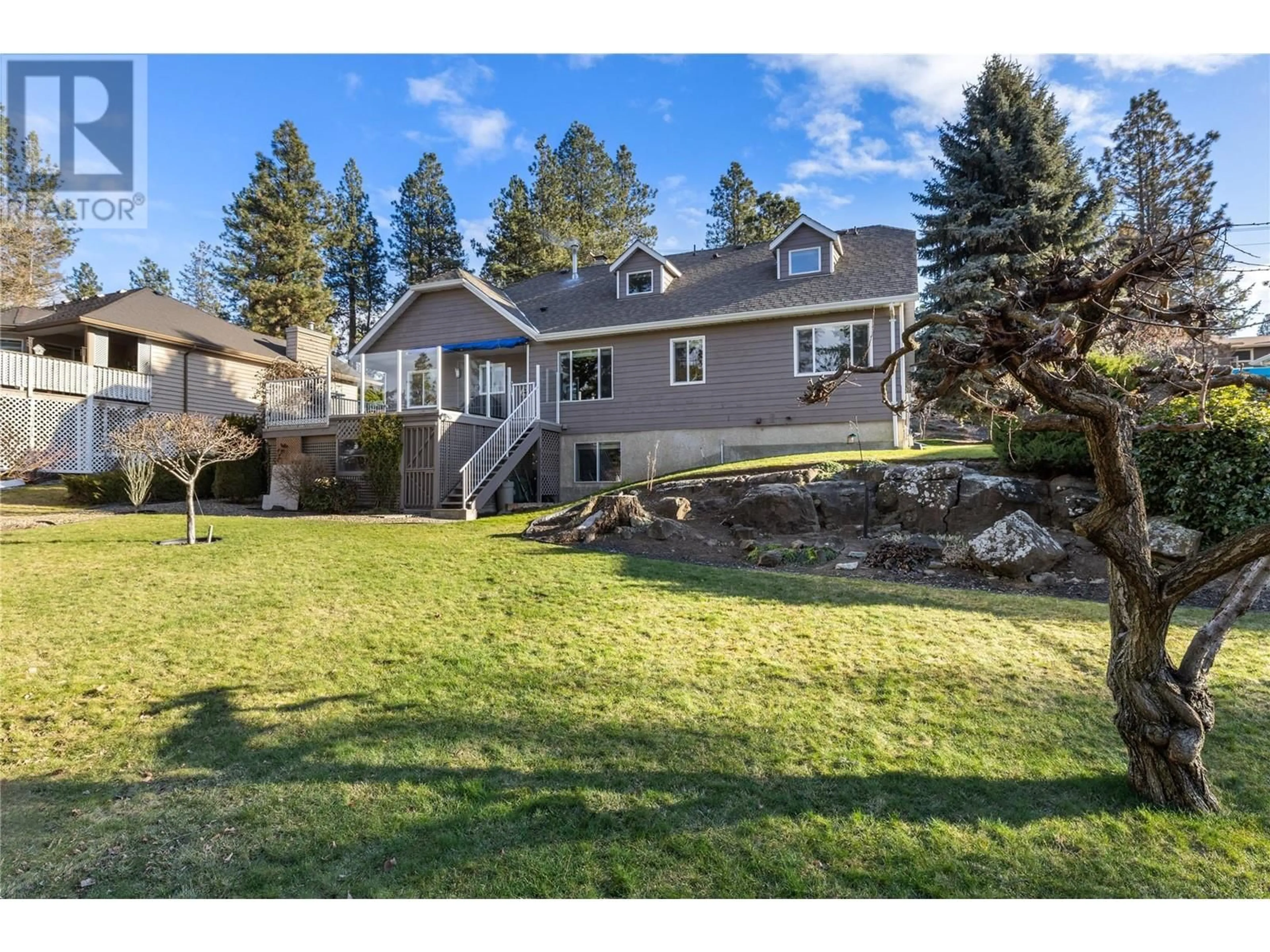 A pic from outside/outdoor area/front of a property/back of a property/a pic from drone, unknown for 2064 Tomat Avenue, West Kelowna British Columbia V1Z3C5