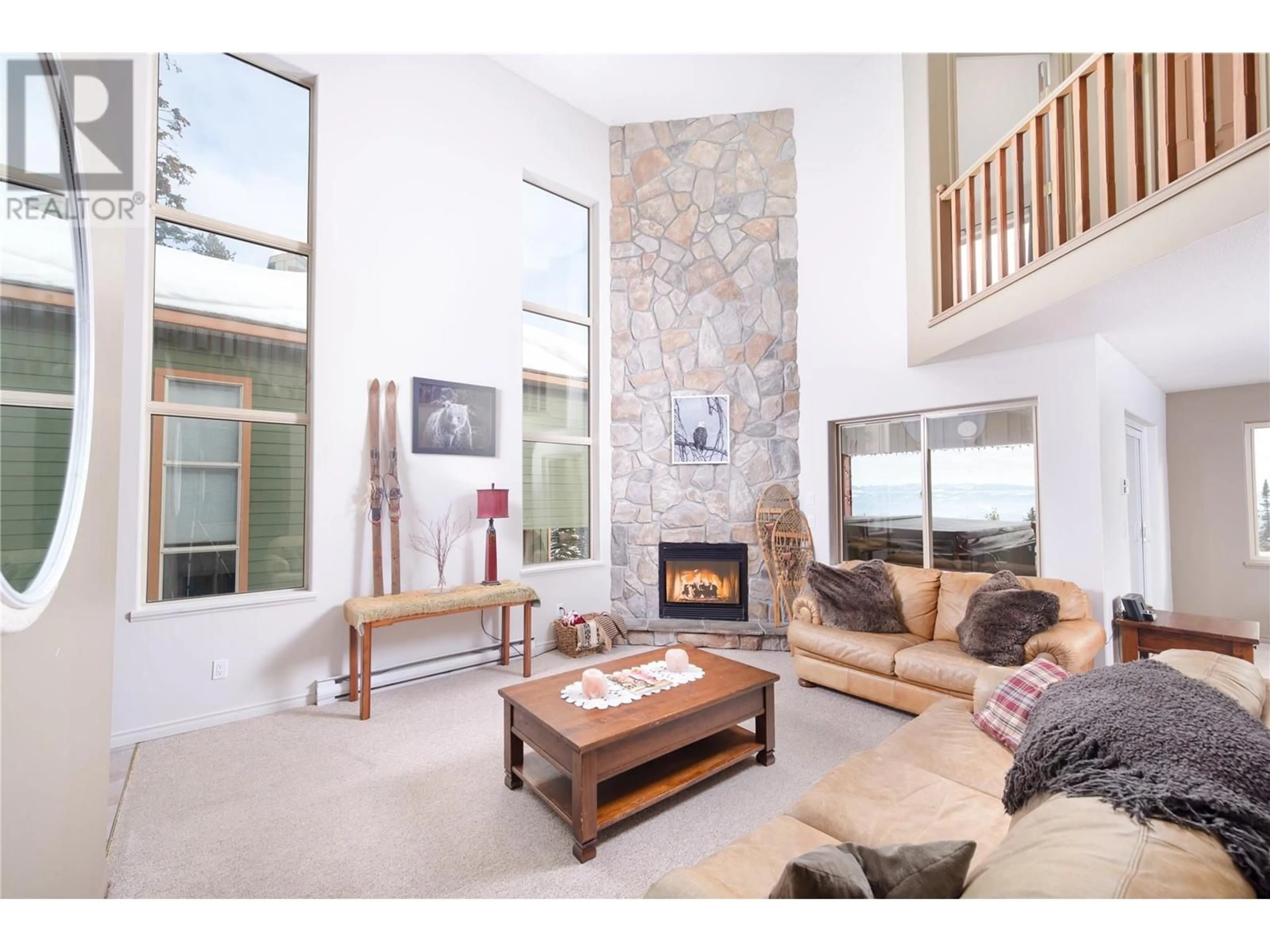 Living room with furniture, unknown for 4849 snowpines Road Unit# d, Big White British Columbia v4x1h6