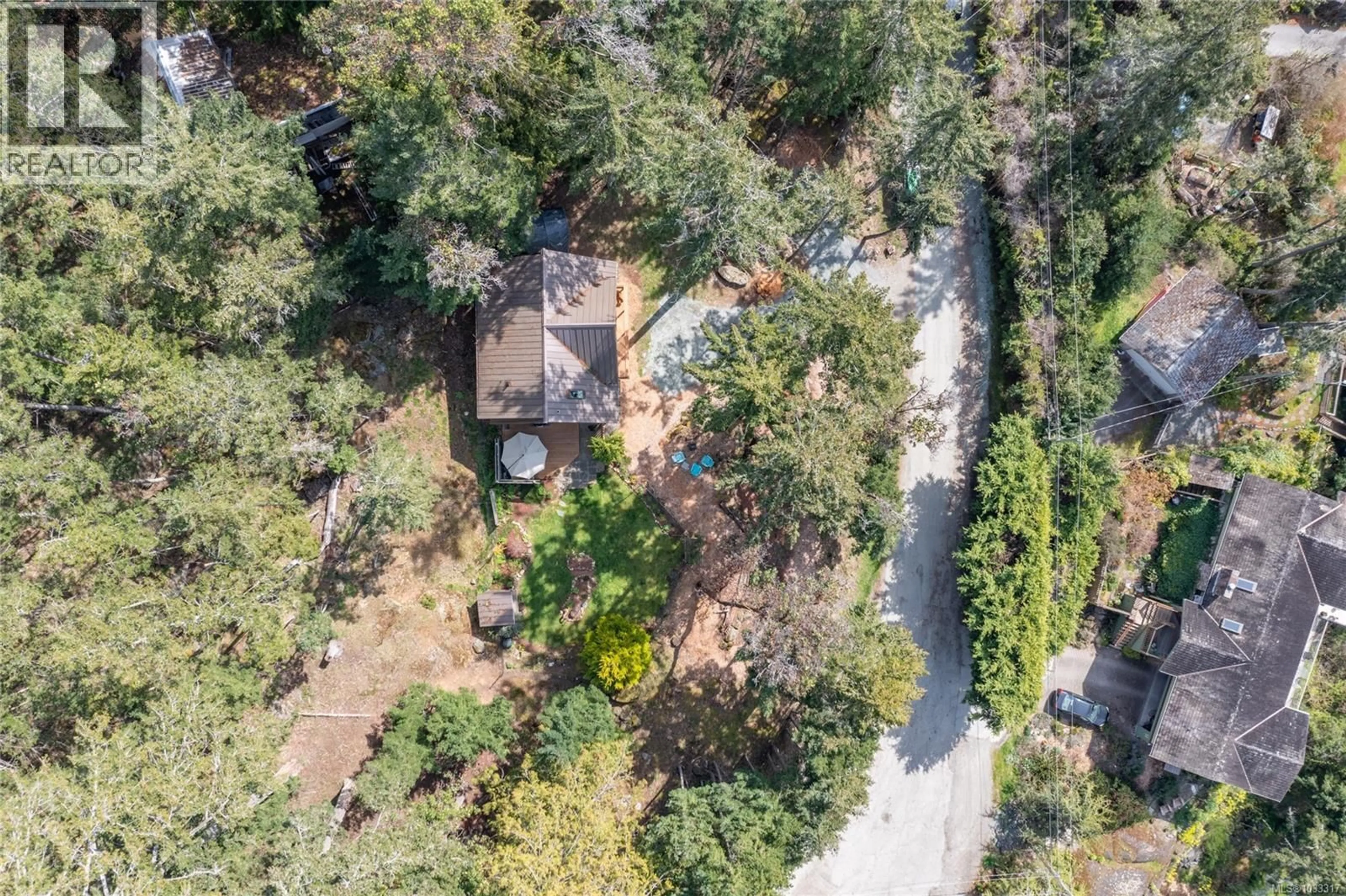 A pic from outside/outdoor area/front of a property/back of a property/a pic from drone, forest/trees view for 4810 CANNON CRESCENT, Pender Island British Columbia V0N2M2