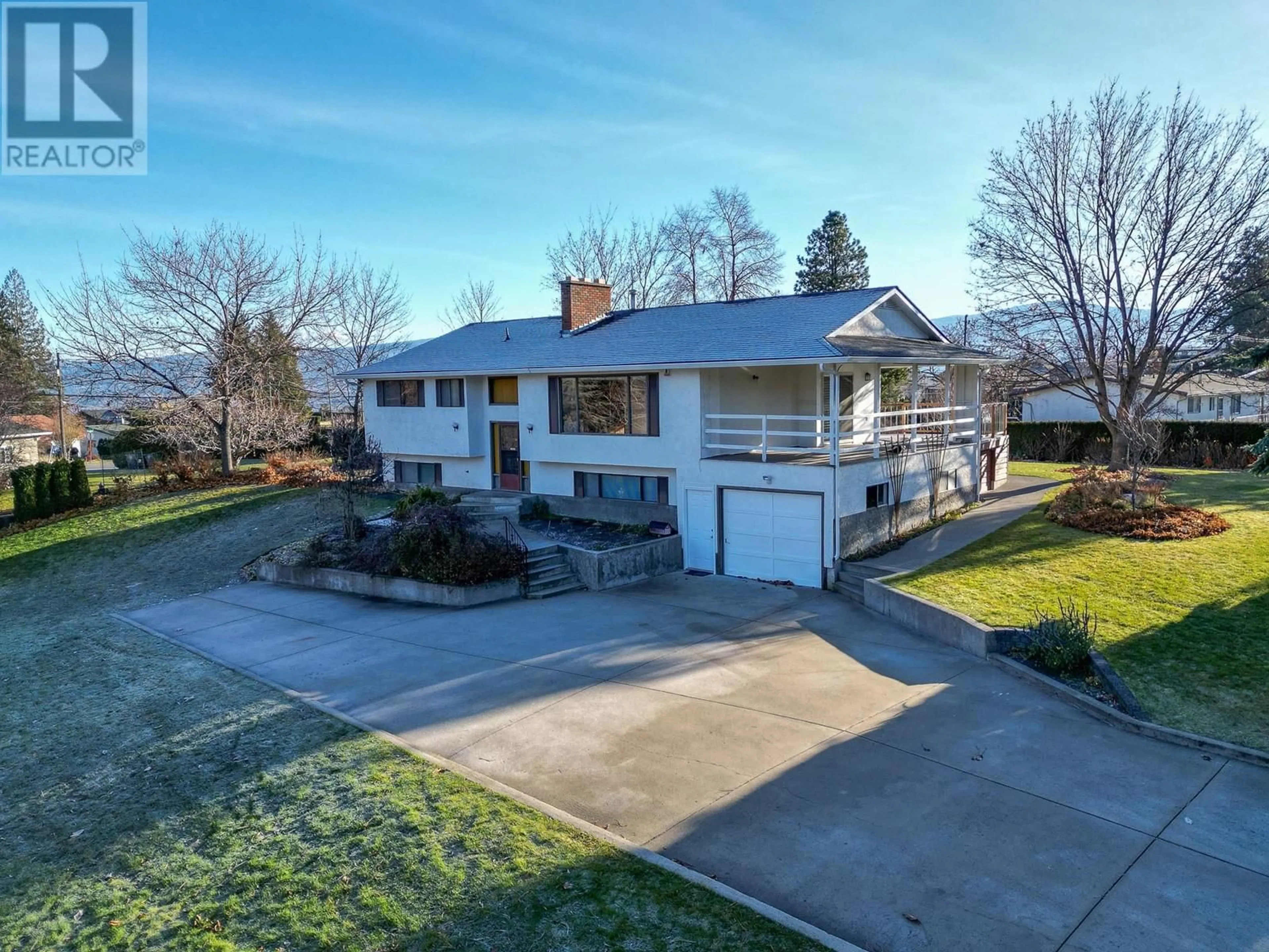 A pic from outside/outdoor area/front of a property/back of a property/a pic from drone, street for 2501 Crestview Road, West Kelowna British Columbia V1Z1Z4