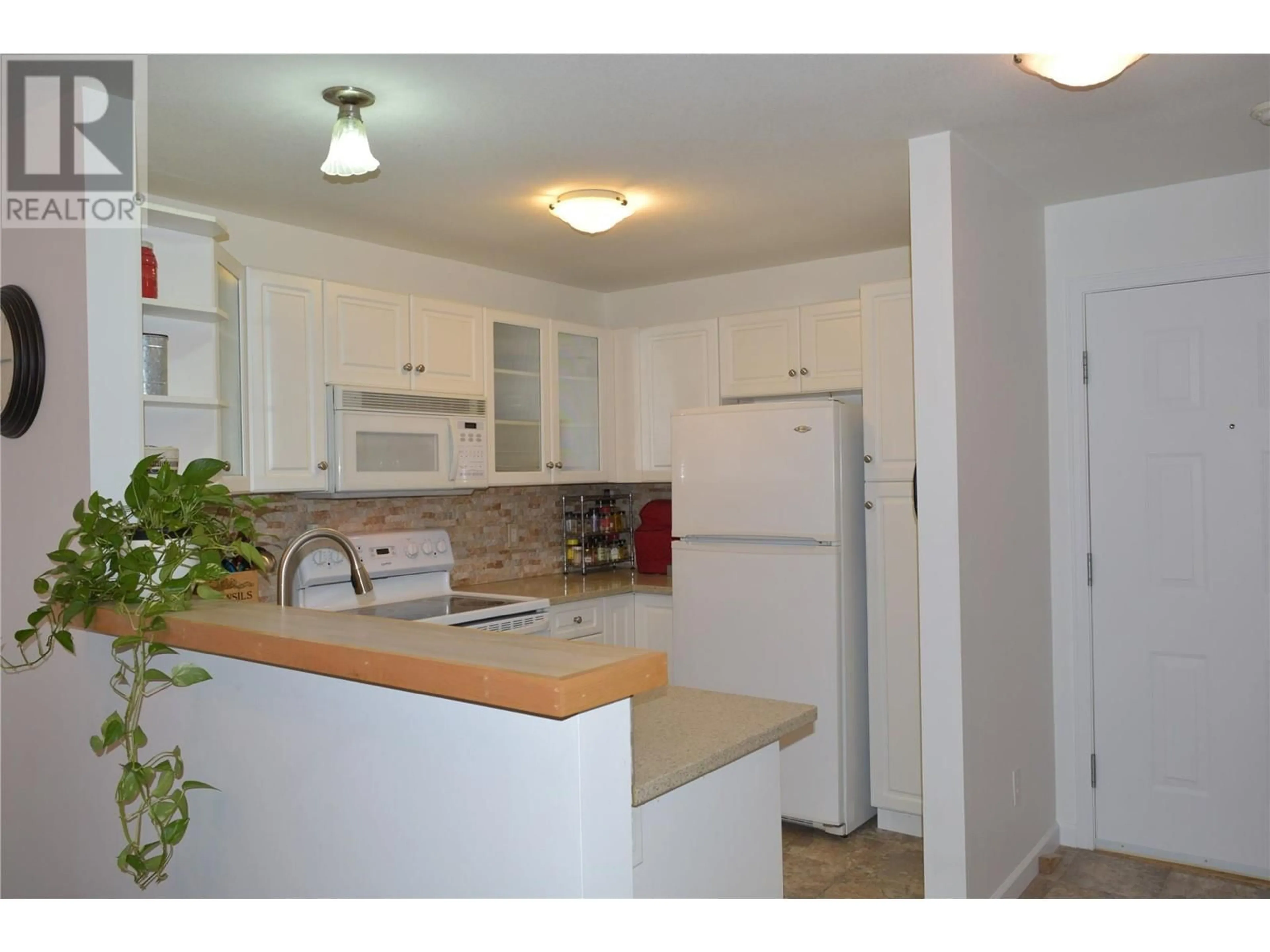 Standard kitchen, unknown for 980 Glenwood Avenue Unit# 211, Kelowna British Columbia V1Y9P2