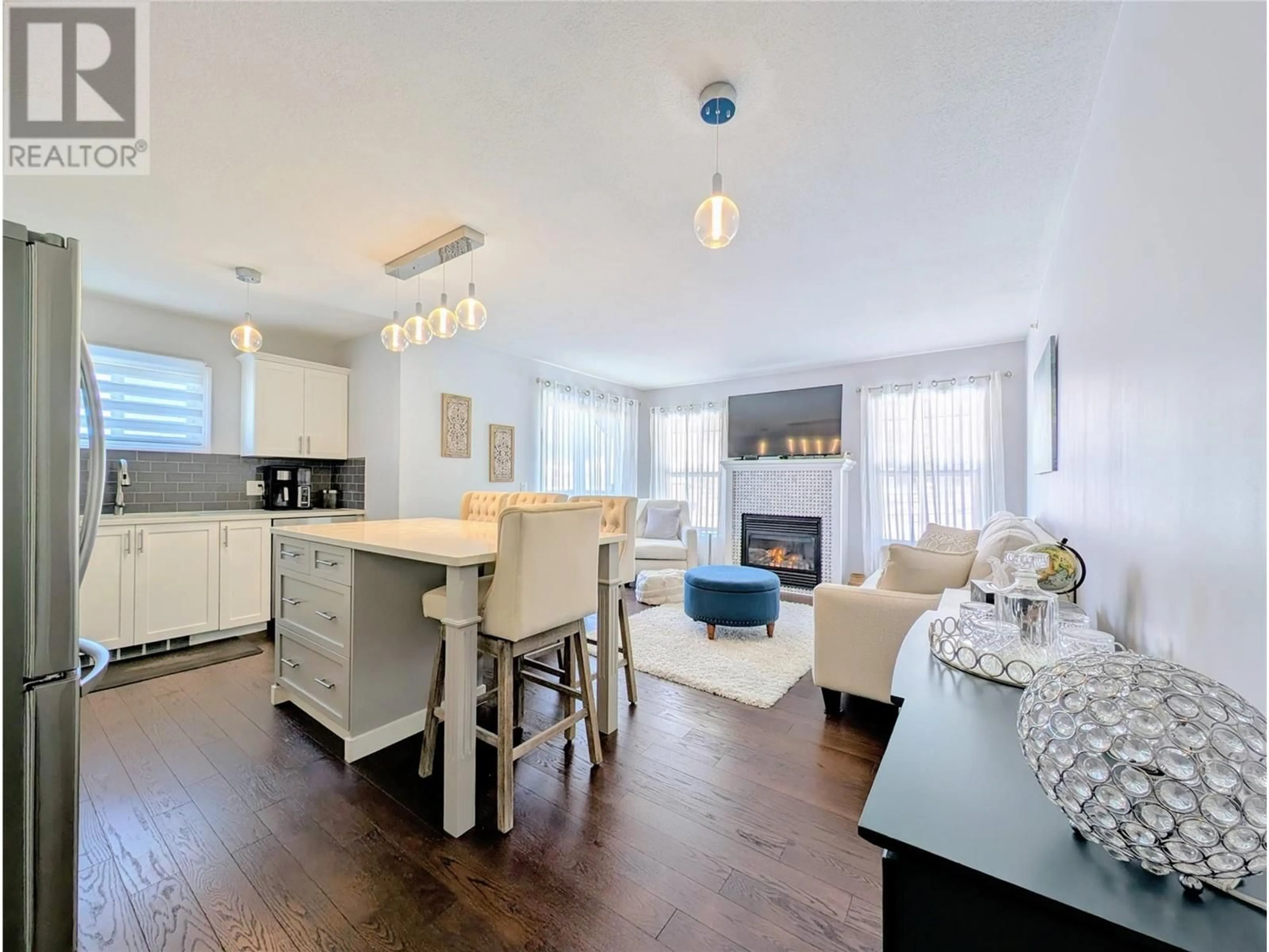 Open concept kitchen, wood/laminate floor for 401 - 4884 STANLEY STREET, Radium Hot Springs British Columbia V0A1M0