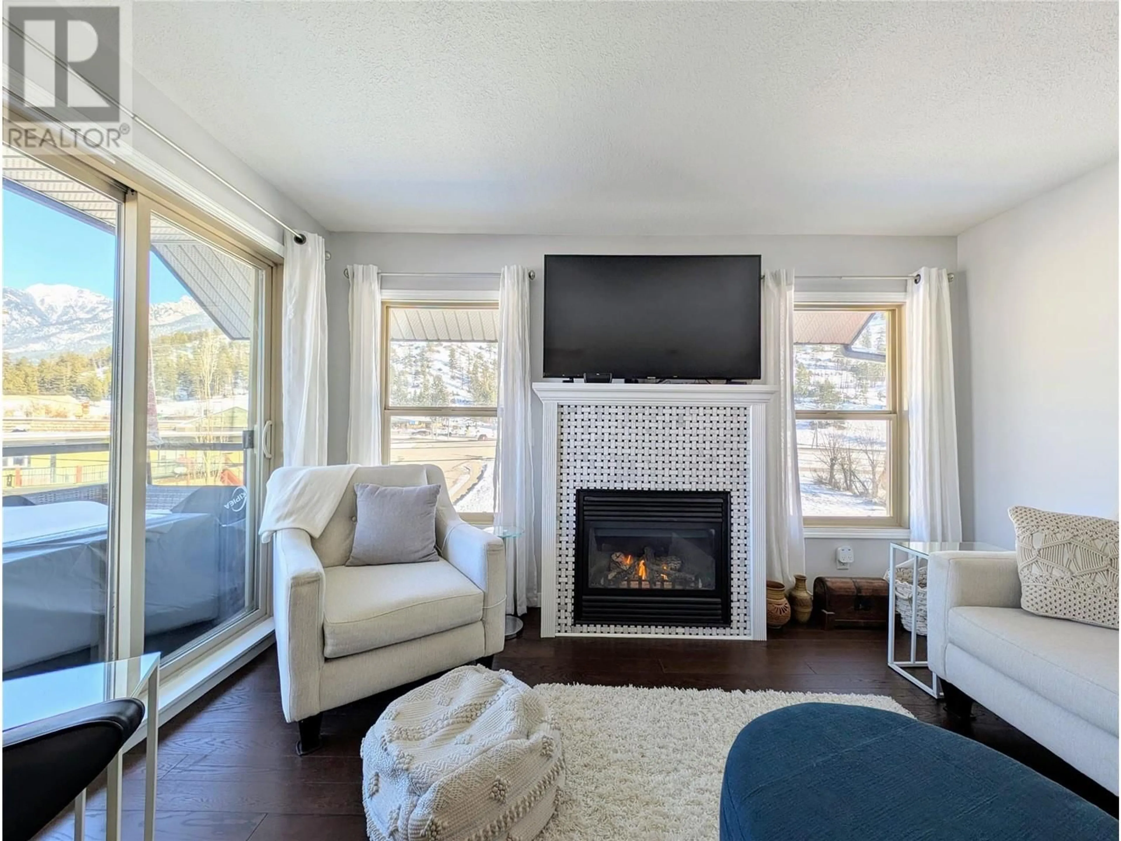 Living room with furniture, unknown for 4884 STANLEY Street Unit# 401, Radium Hot Springs British Columbia V0A1M0