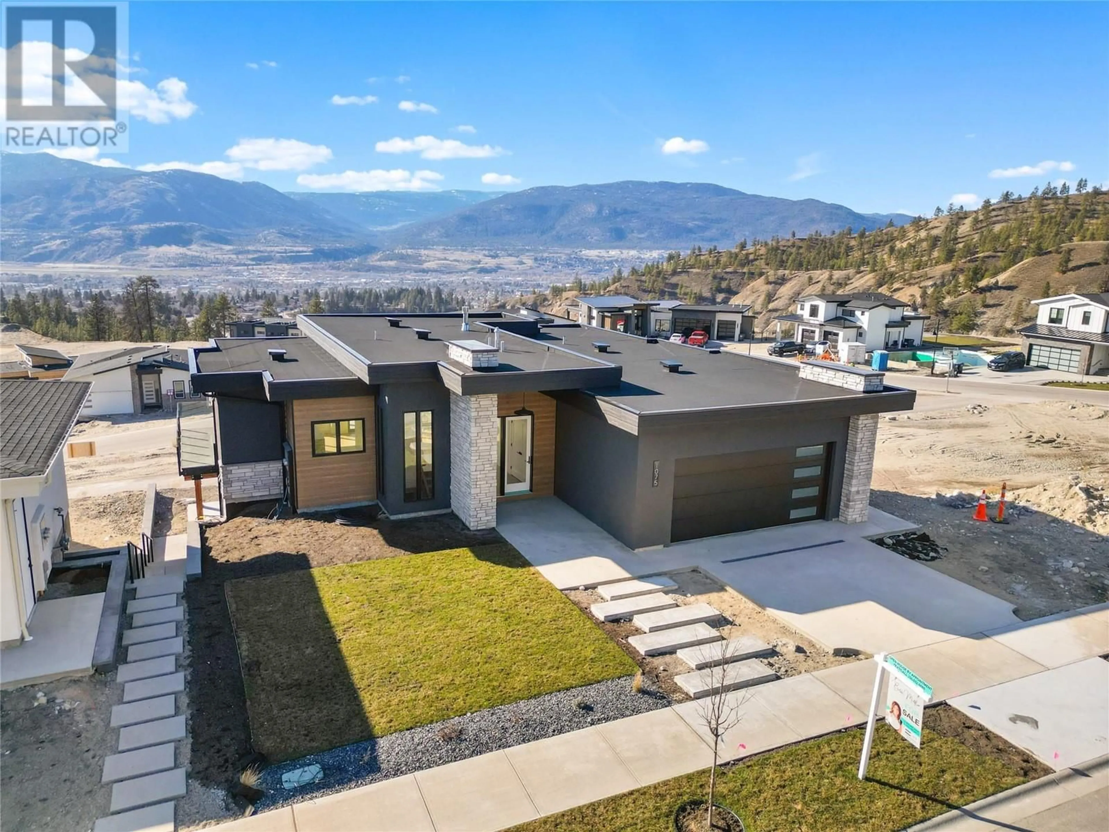 A pic from outside/outdoor area/front of a property/back of a property/a pic from drone, mountain view for 1075 Elk Street, Penticton British Columbia V2A0C9