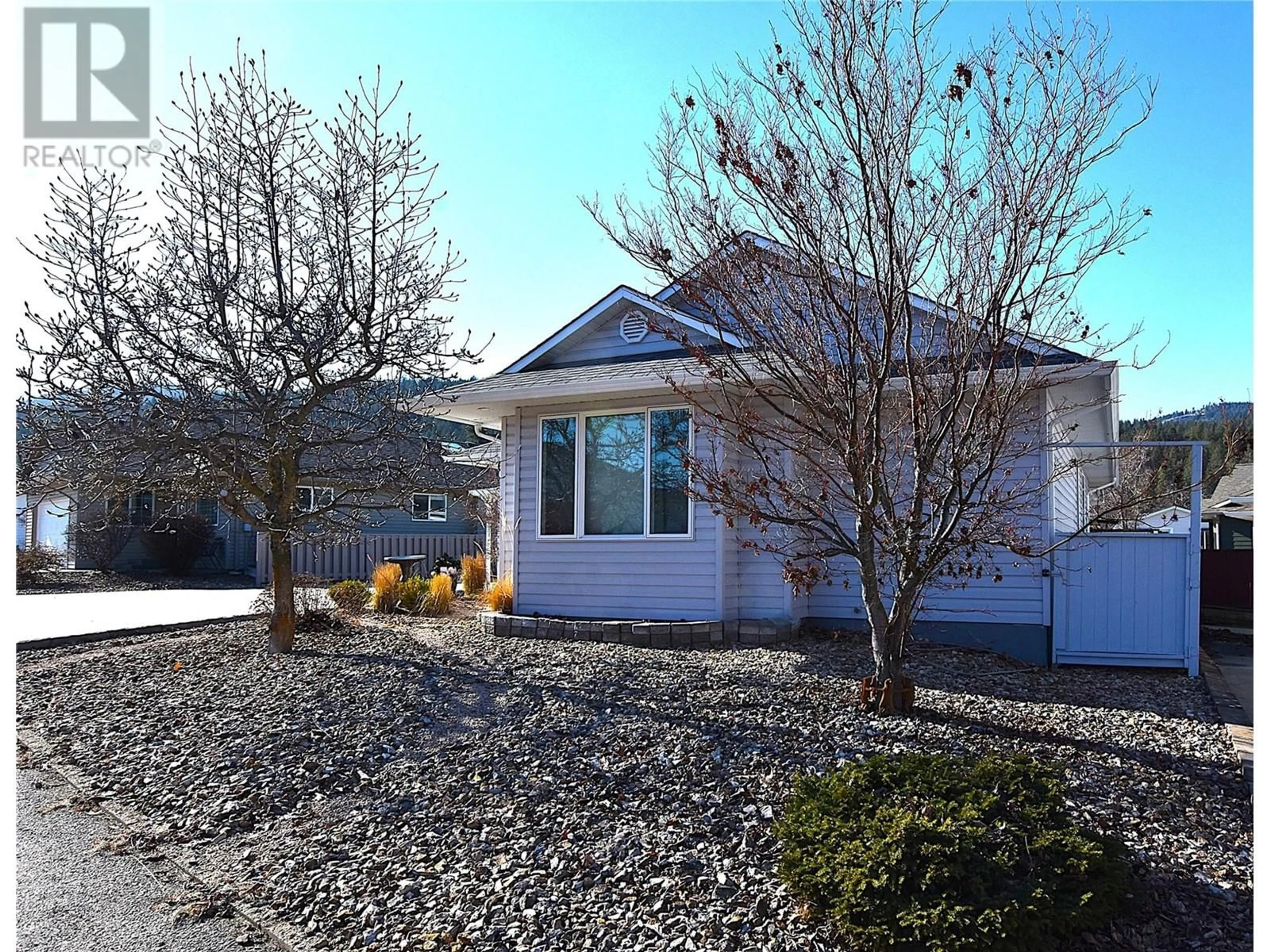Home with vinyl exterior material, street for 606 NIGHTHAWK AVENUE, Vernon British Columbia V1H2A1