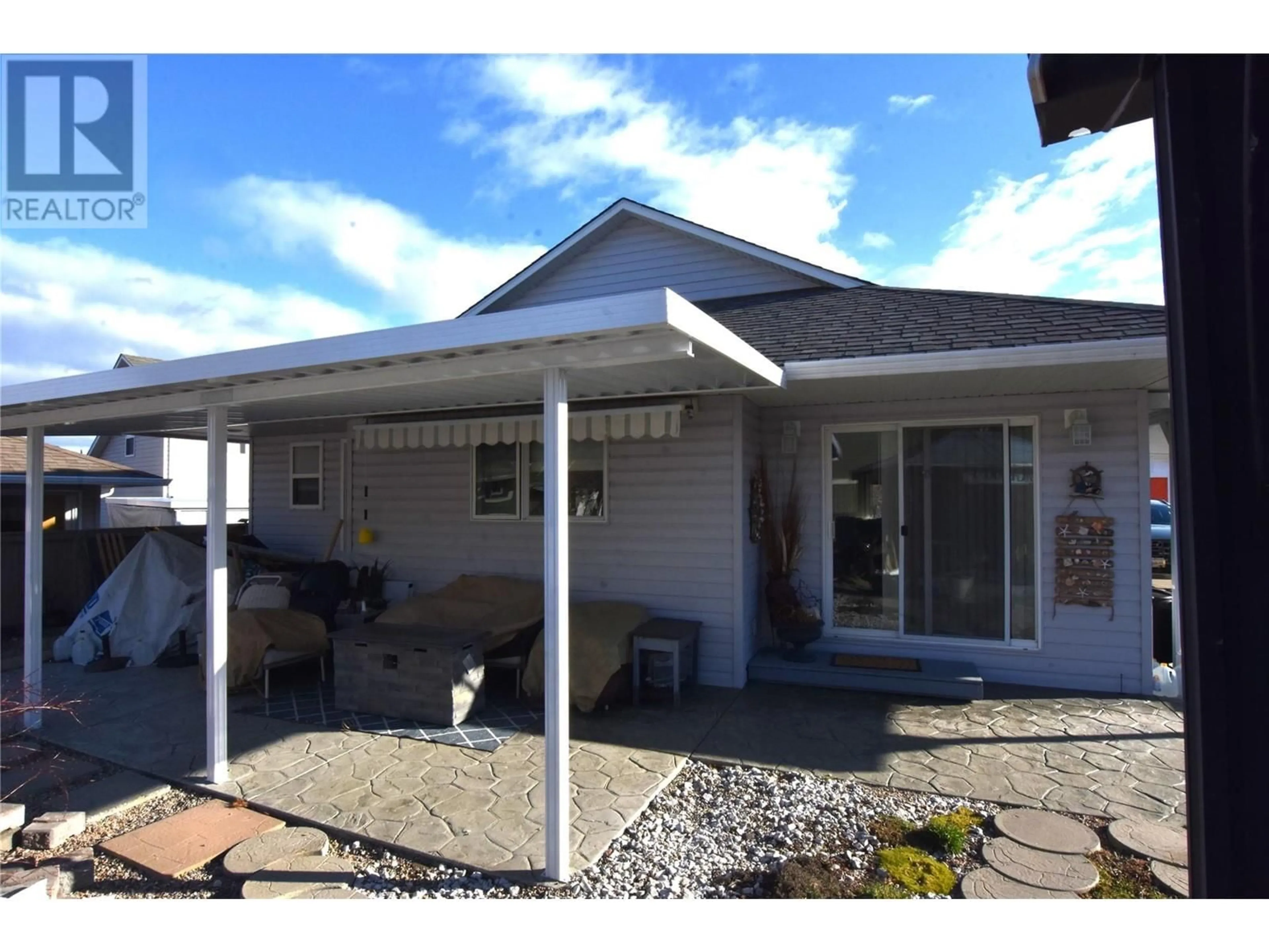 Home with vinyl exterior material, street for 606 NIGHTHAWK AVENUE, Vernon British Columbia V1H2A1