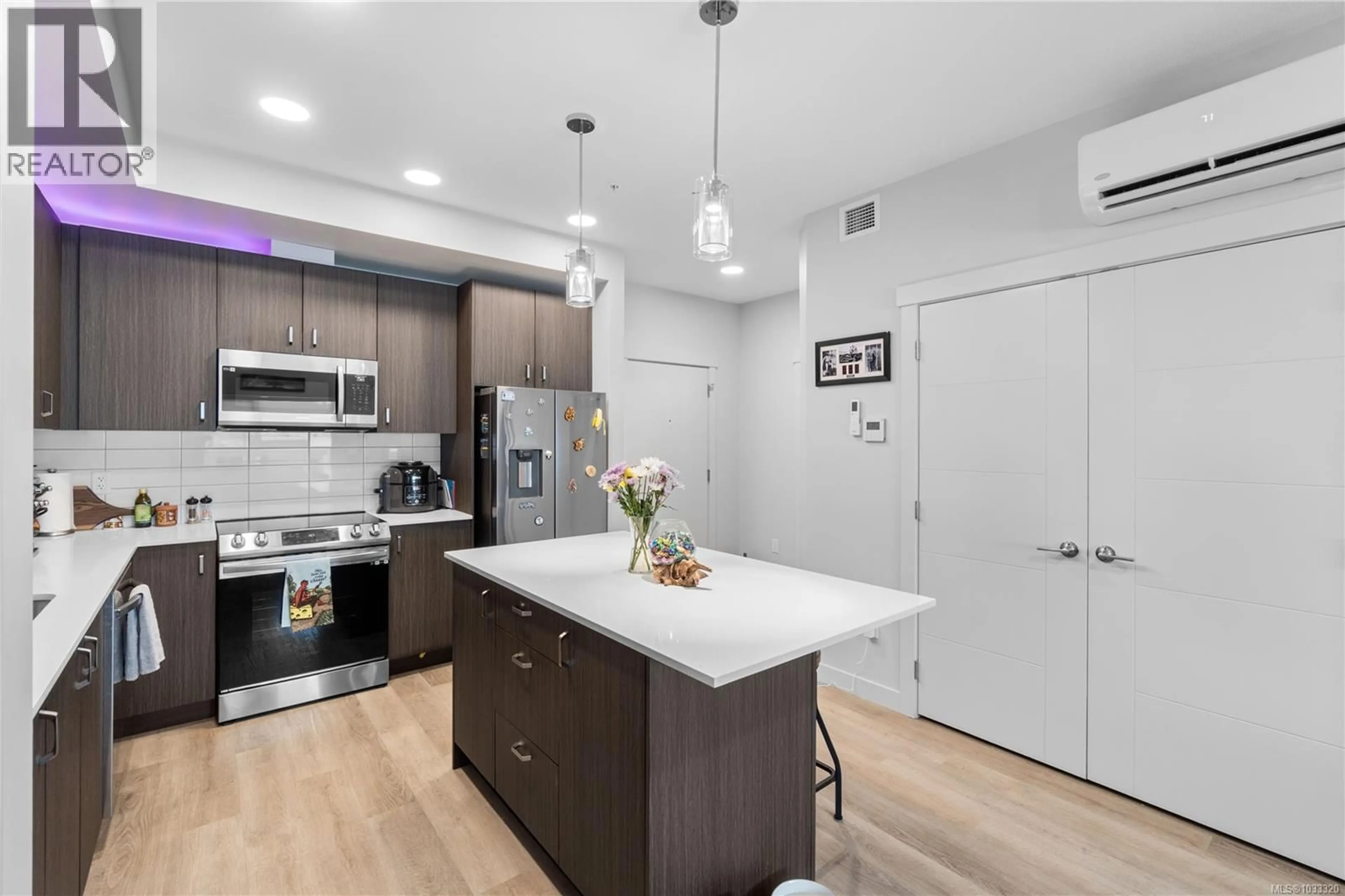 Open concept kitchen, unknown for 302 - 164 ALBERNI HIGHWAY, Parksville British Columbia V9P1L9