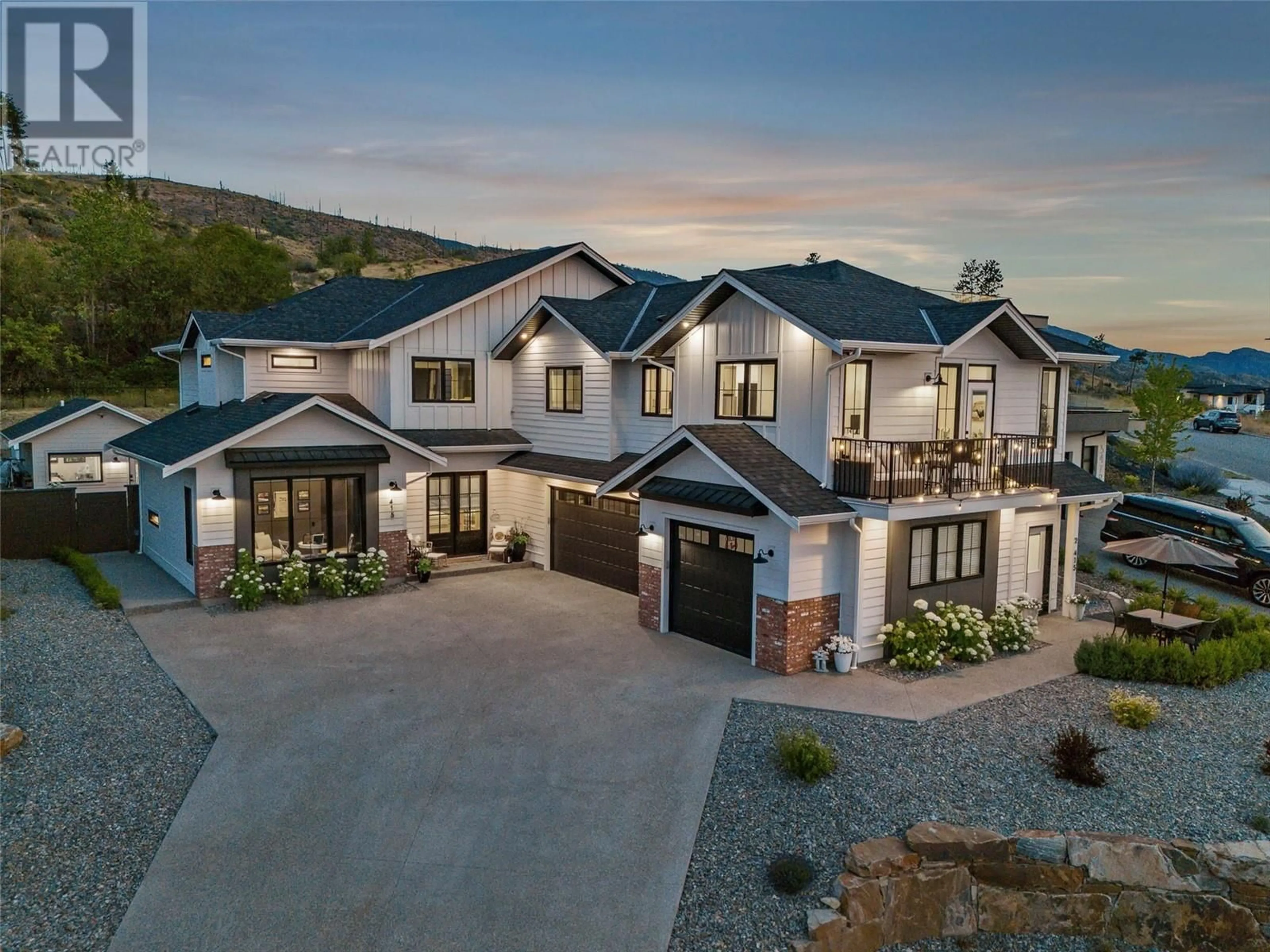 A pic from outside/outdoor area/front of a property/back of a property/a pic from drone, mountain view for 415 HAWK HILL DRIVE, Kelowna British Columbia V1W0B1