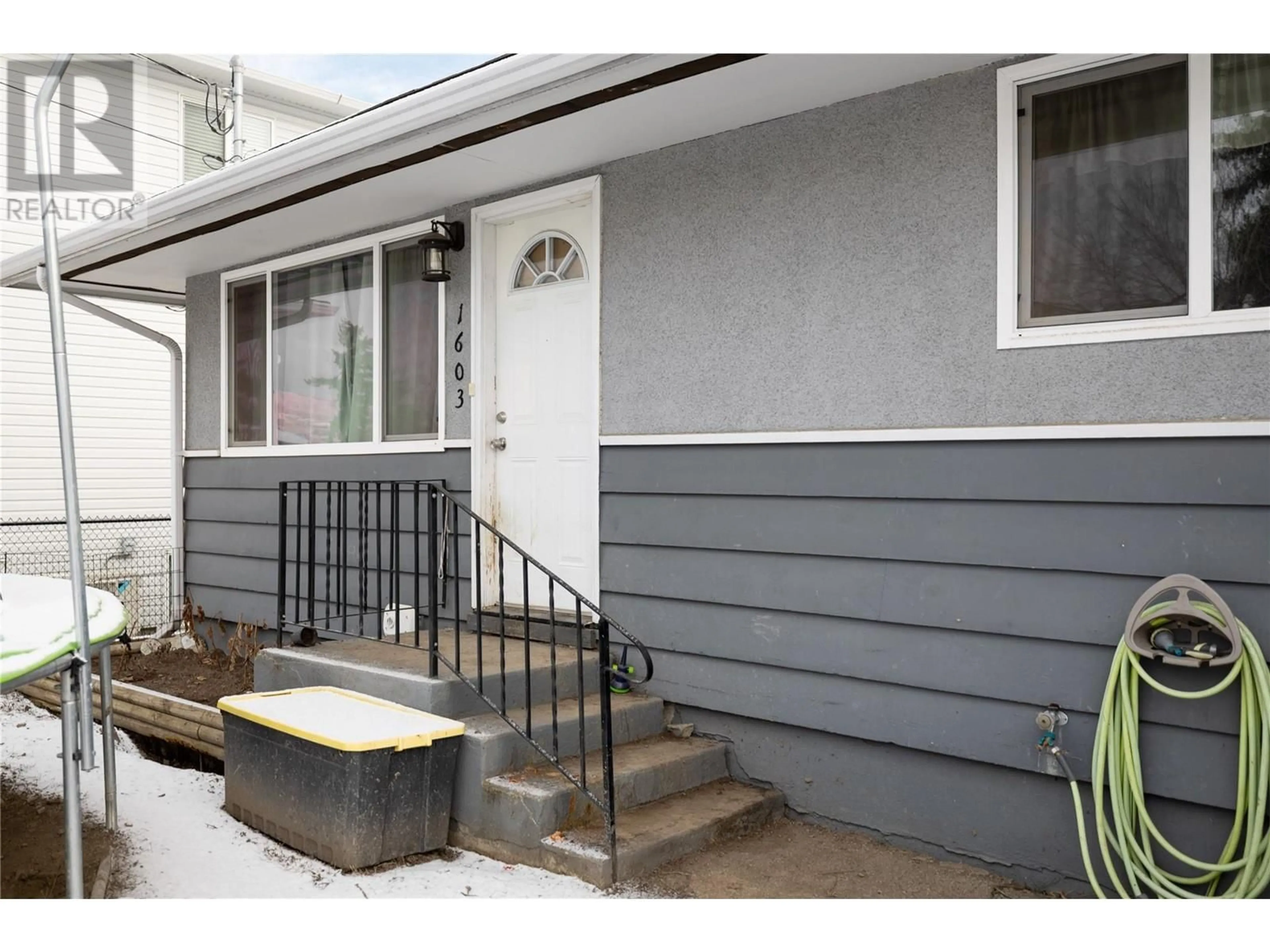 Home with vinyl exterior material, street for 1603 A 31 Street, Vernon British Columbia V1T5T7