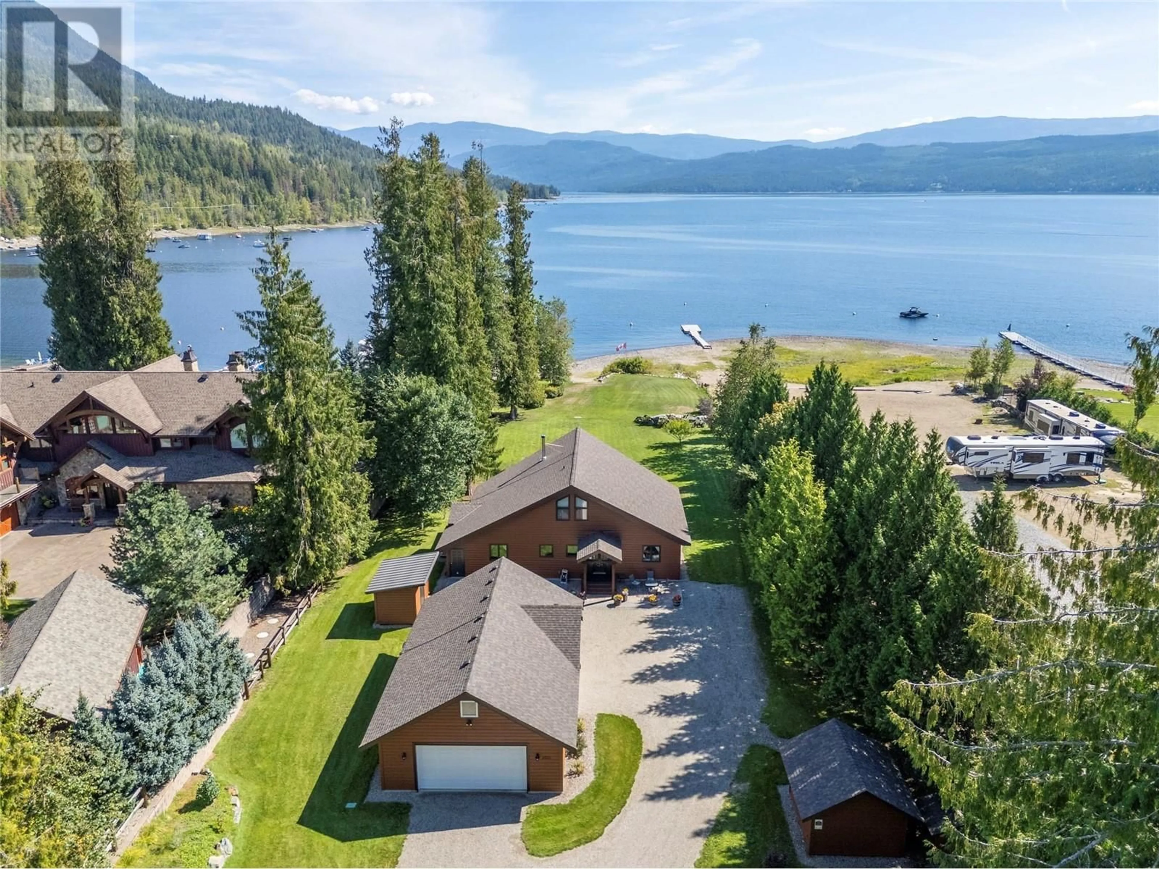 A pic from outside/outdoor area/front of a property/back of a property/a pic from drone, water/lake/river/ocean view for 2520 WELCH PLACE, Magna Bay British Columbia V0E1M7