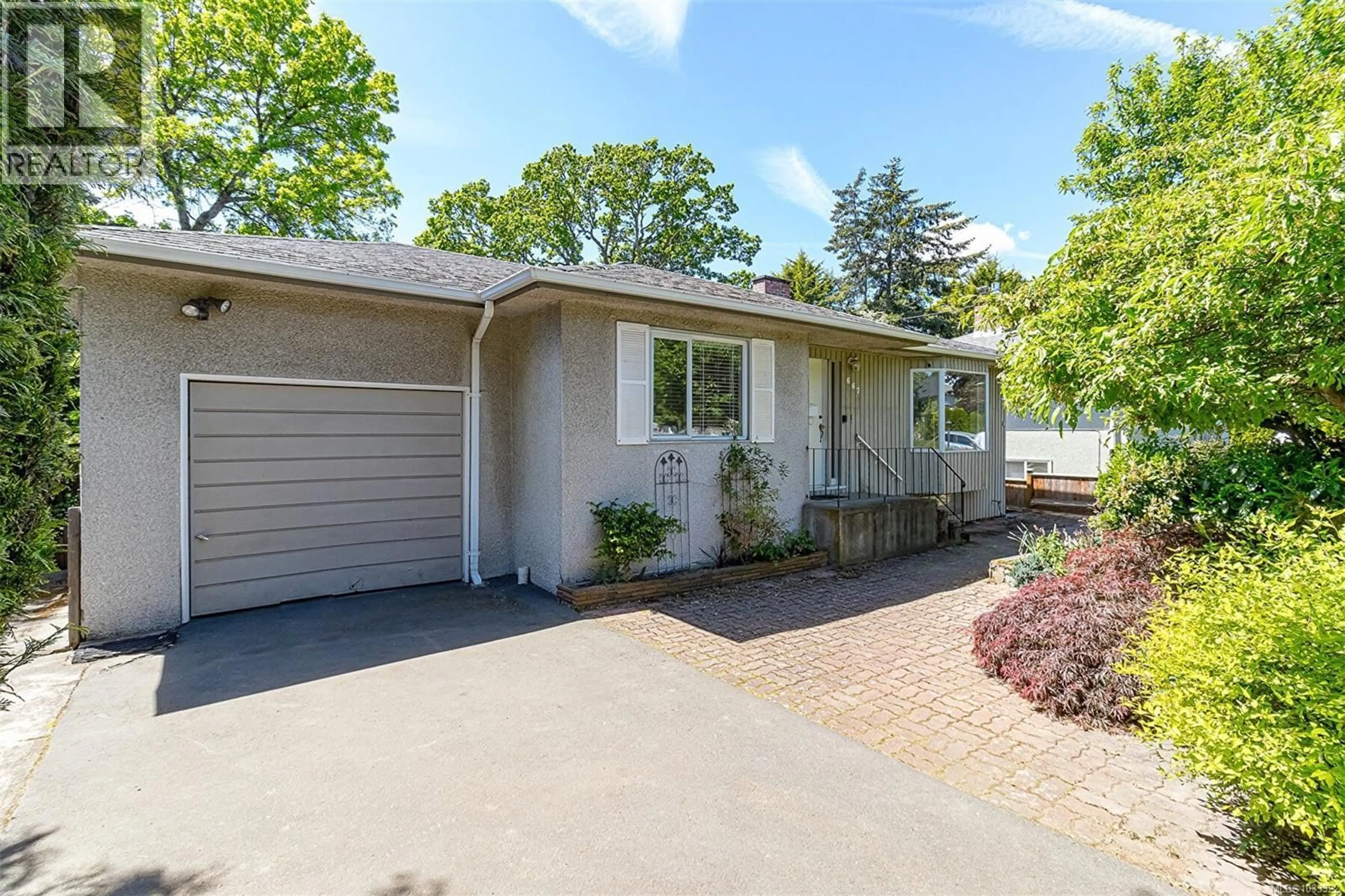 Home with brick exterior material, street for 667 JONES TERRACE, Saanich British Columbia V8Z2L6