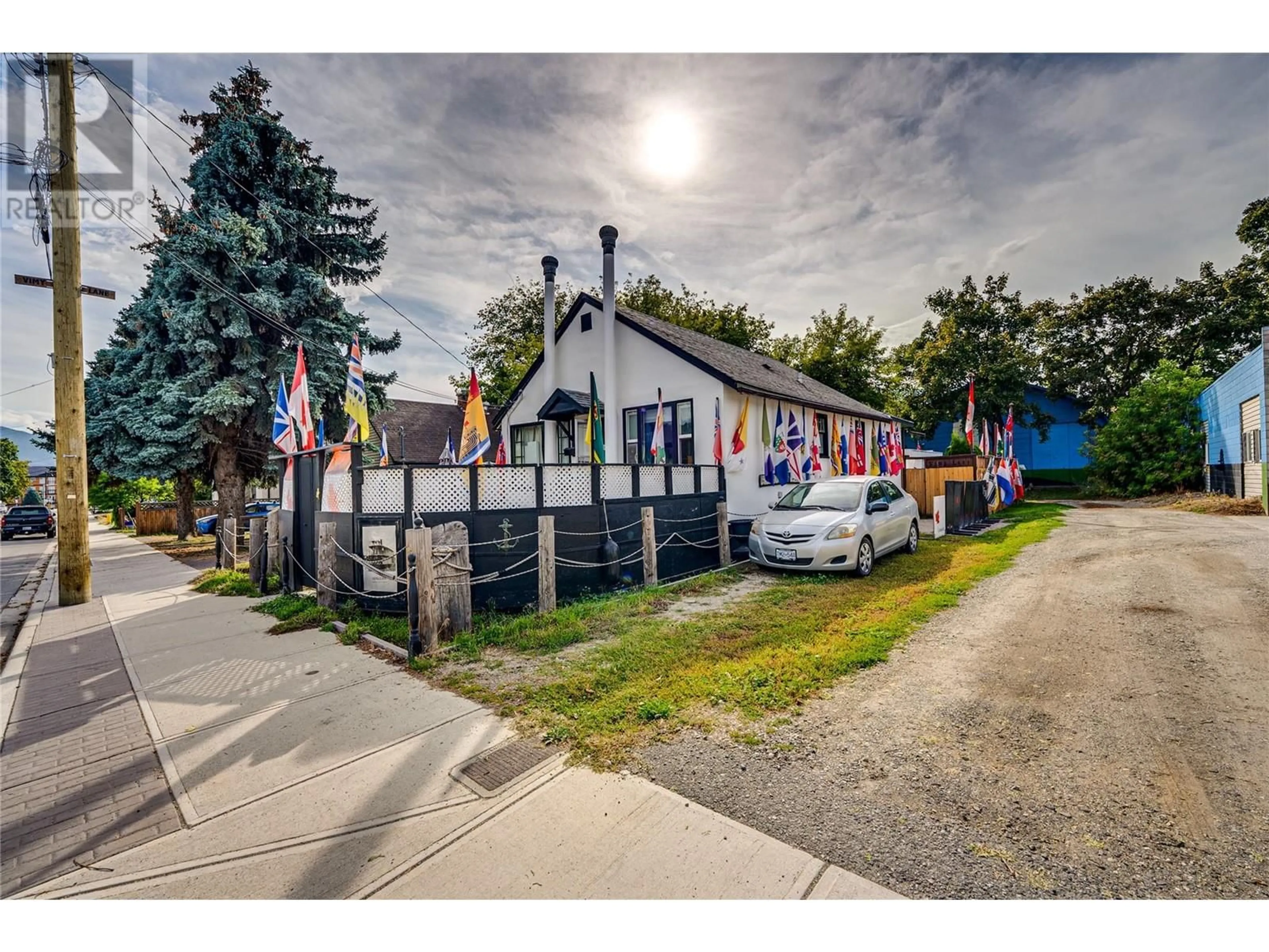 A pic from outside/outdoor area/front of a property/back of a property/a pic from drone, street for 4008 29 Street, Vernon British Columbia V1T5B4