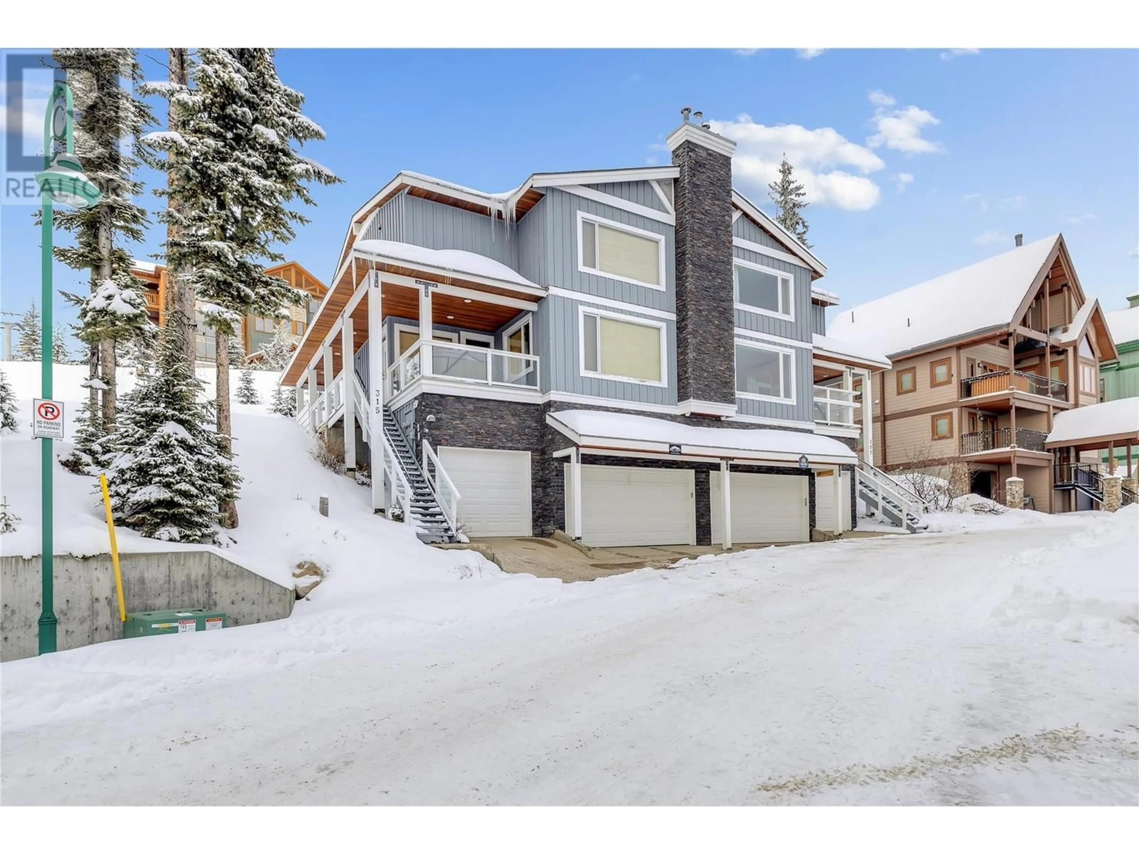 A pic from outside/outdoor area/front of a property/back of a property/a pic from drone, street for 315 BEAR FOOT LANE, Big White British Columbia V1P1P3
