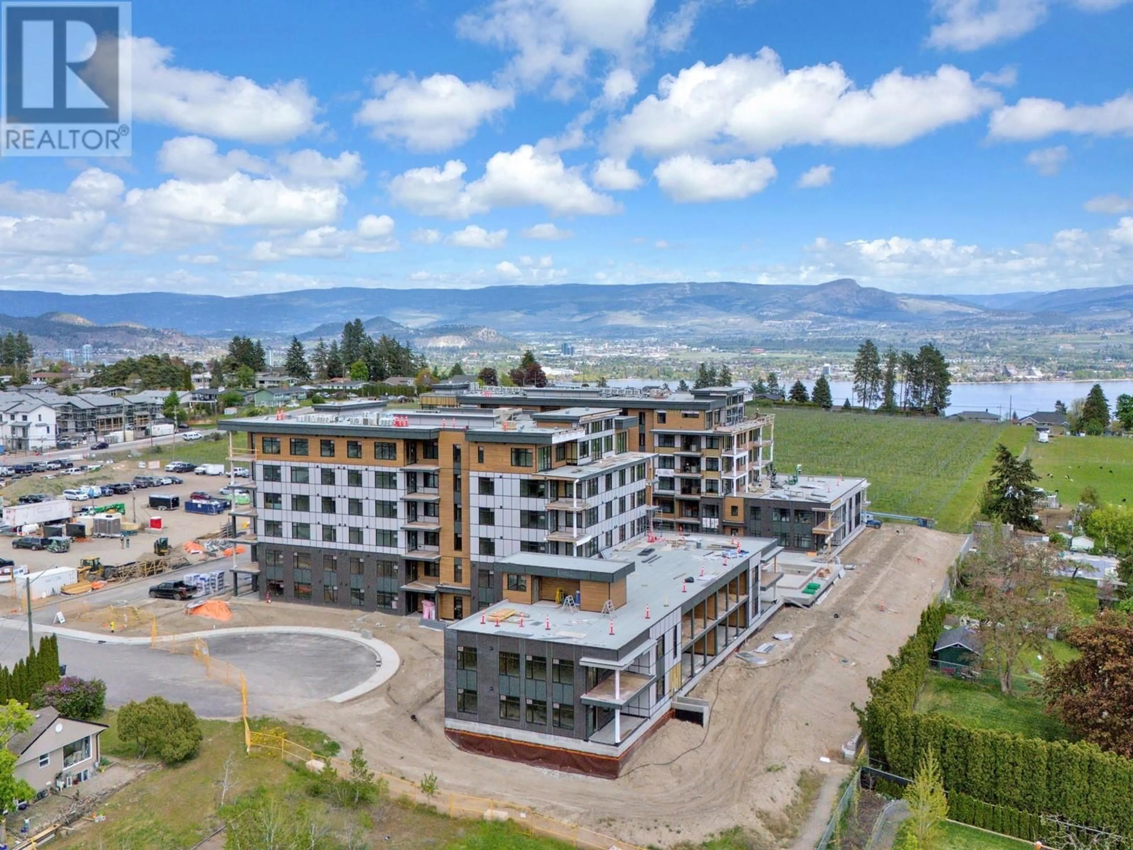 A pic from outside/outdoor area/front of a property/back of a property/a pic from drone, mountain view for 502 - 2760 OLALLA ROAD, West Kelowna British Columbia V1Z2A9