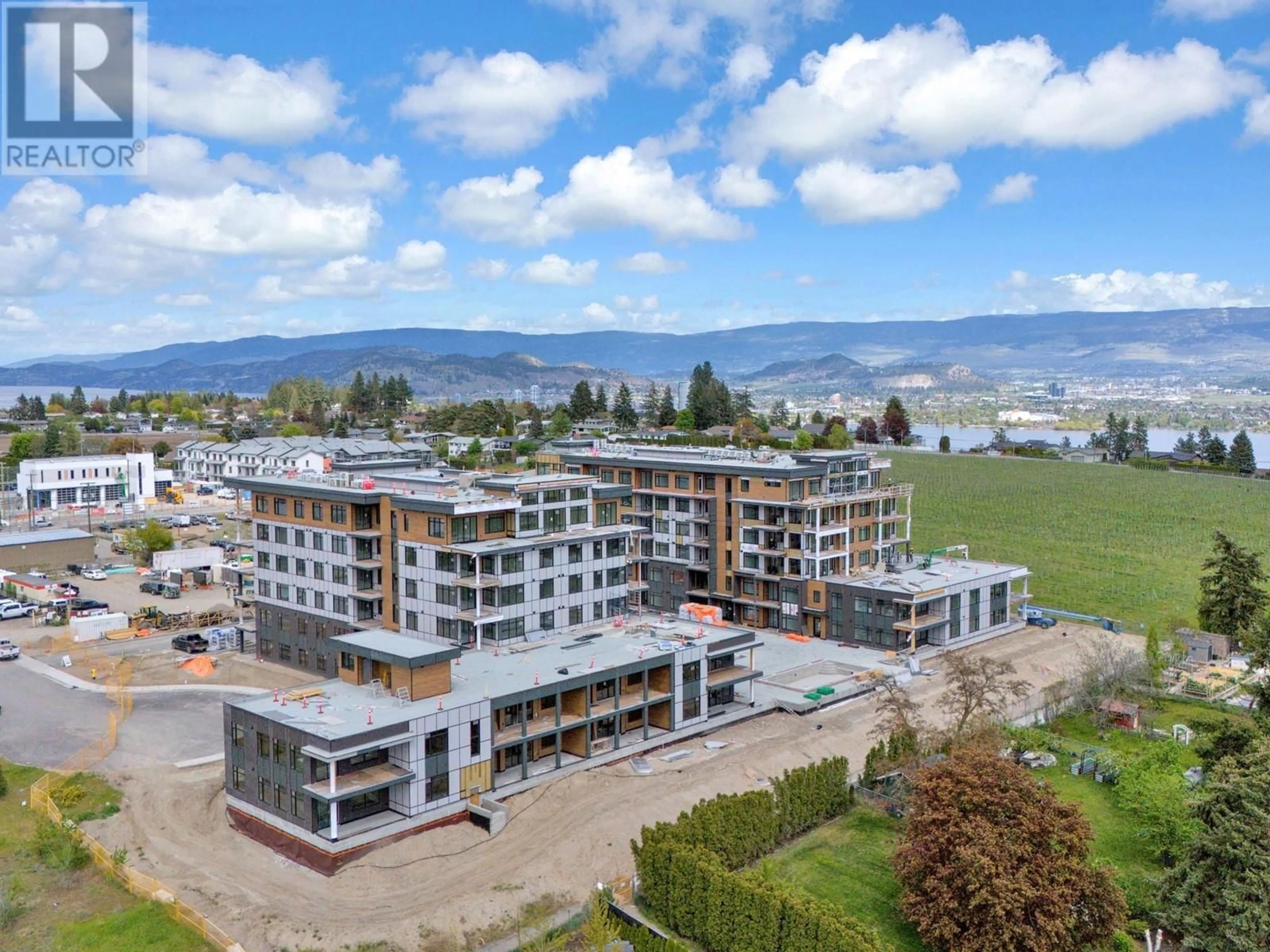 A pic from outside/outdoor area/front of a property/back of a property/a pic from drone, mountain view for 502 - 2760 OLALLA ROAD, West Kelowna British Columbia V1Z2A9