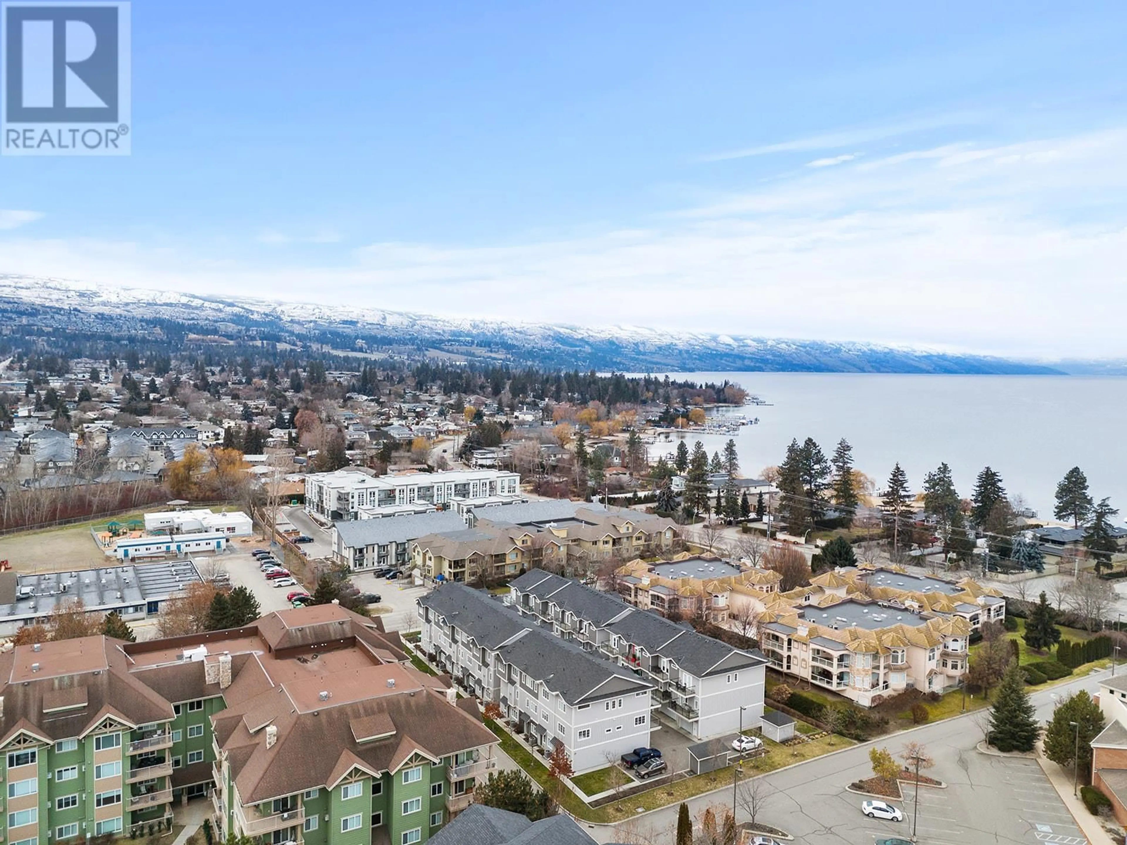 A pic from outside/outdoor area/front of a property/back of a property/a pic from drone, water/lake/river/ocean view for 644 Lequime Road Unit# 15, Kelowna British Columbia V1W1A4