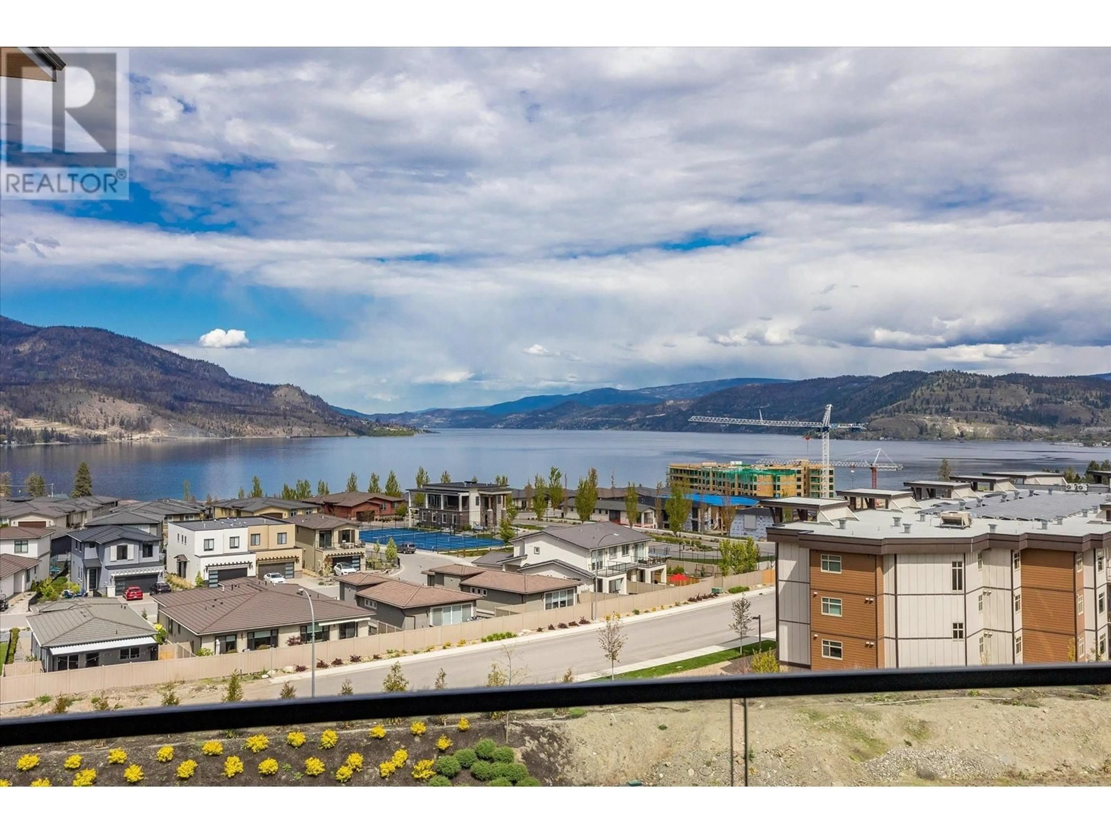 A pic from outside/outdoor area/front of a property/back of a property/a pic from drone, water/lake/river/ocean view for 3000 Ariva Drive Unit# 3405, Kelowna British Columbia V1Z0B3