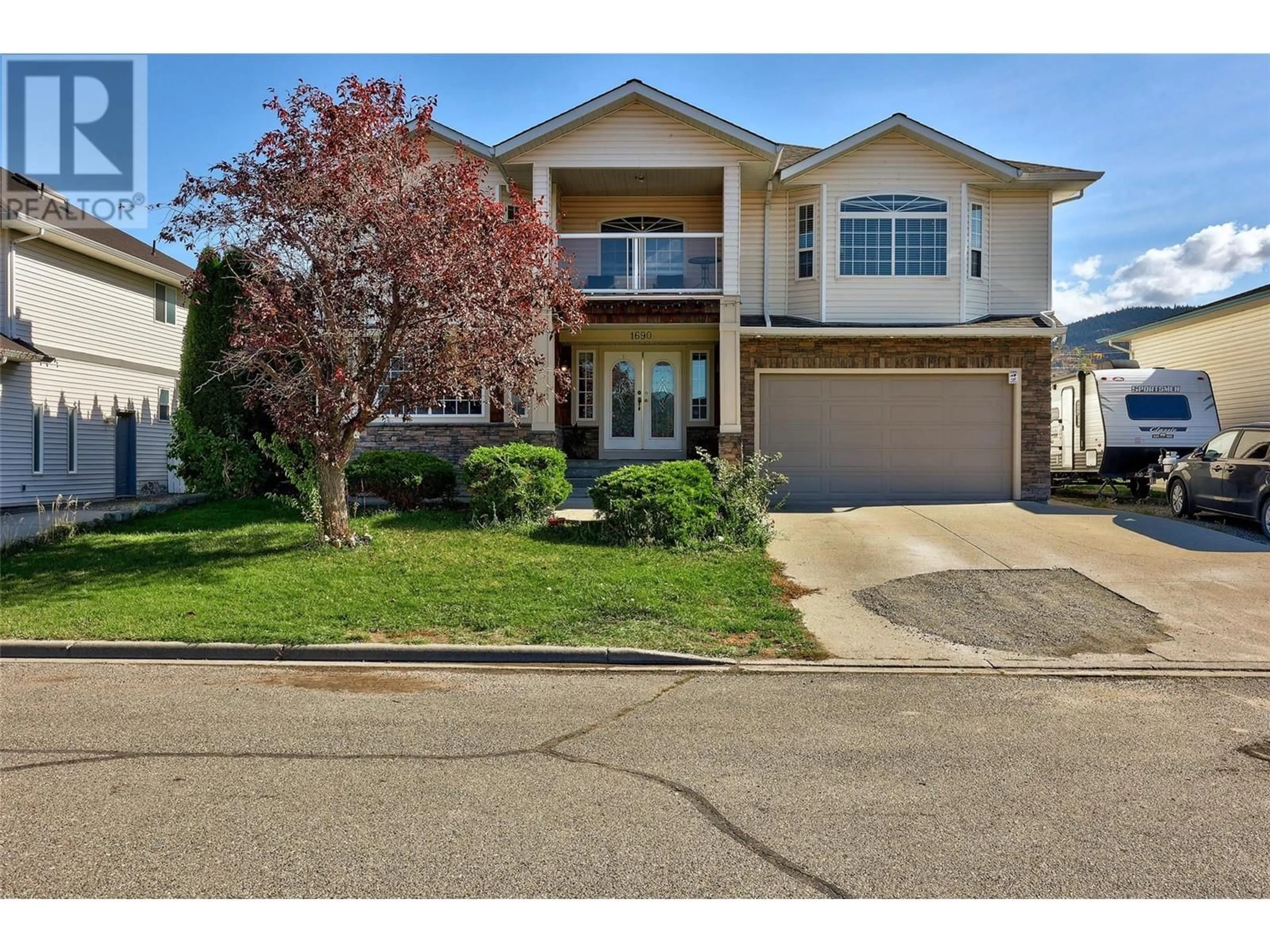 Home with vinyl exterior material, street for 1690 BANN STREET, Merritt British Columbia V1K1E9