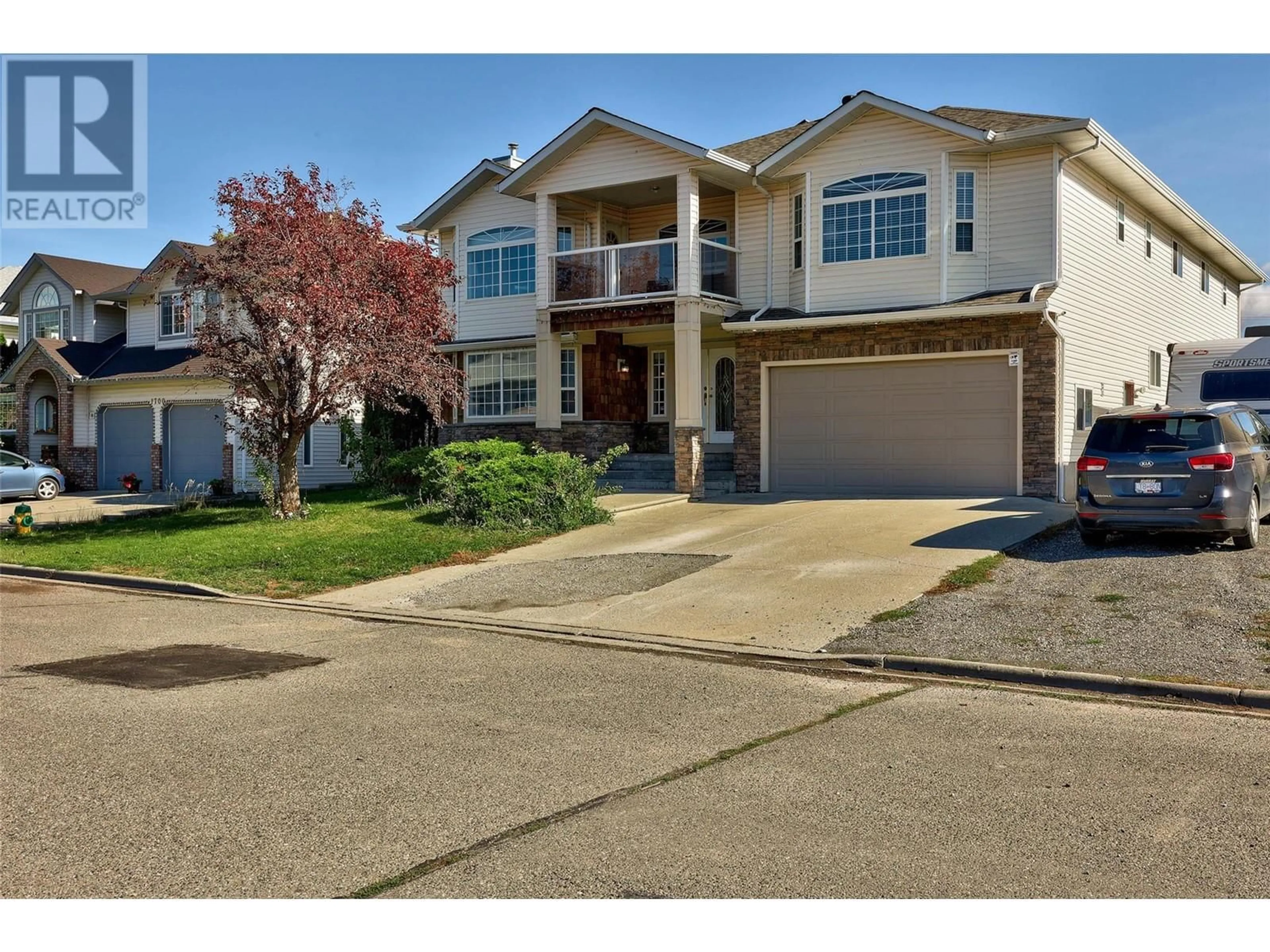 Home with vinyl exterior material, street for 1690 BANN STREET, Merritt British Columbia V1K1E9