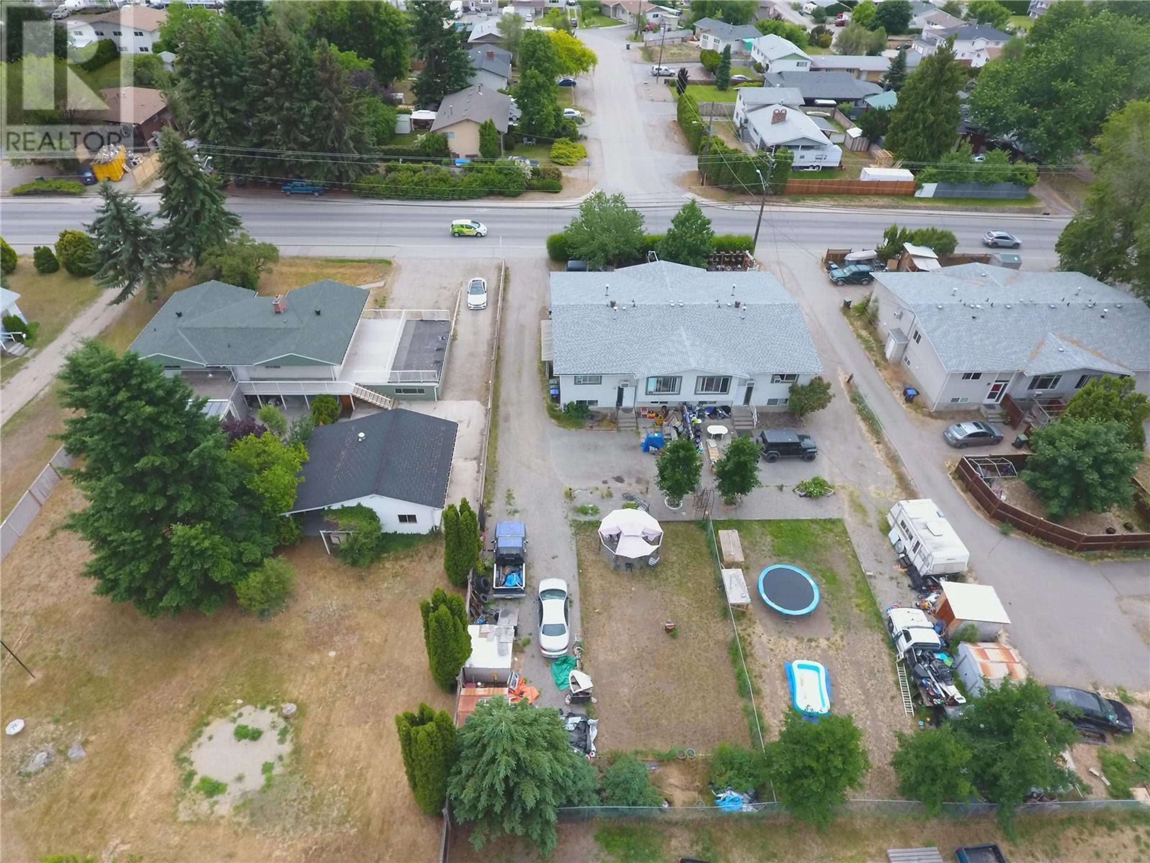 A pic from outside/outdoor area/front of a property/back of a property/a pic from drone, street for 510-530 MCCURDY ROAD, Kelowna British Columbia V1X2P5