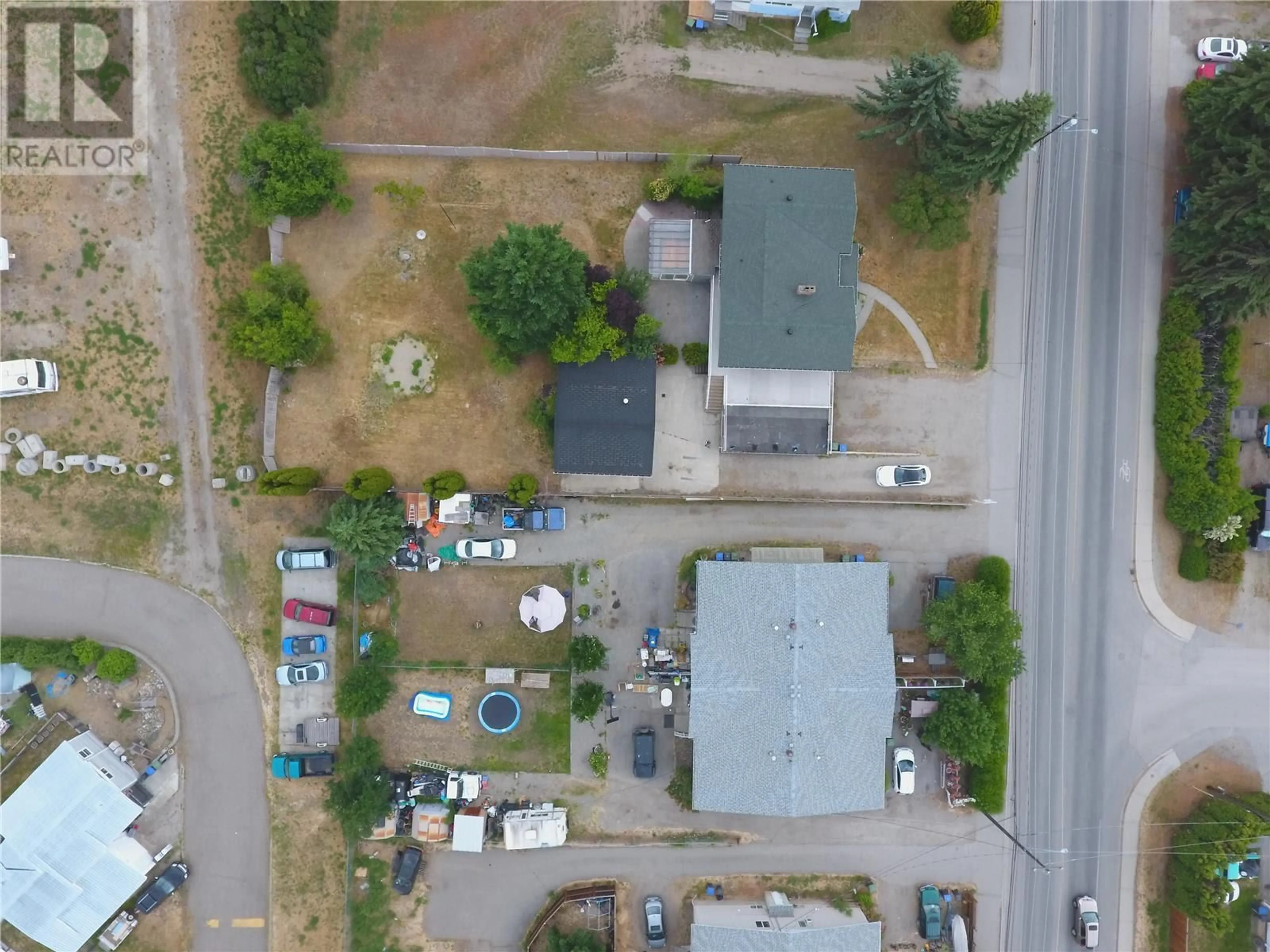A pic from outside/outdoor area/front of a property/back of a property/a pic from drone, street for 510-530 MCCURDY ROAD, Kelowna British Columbia V1X2P5