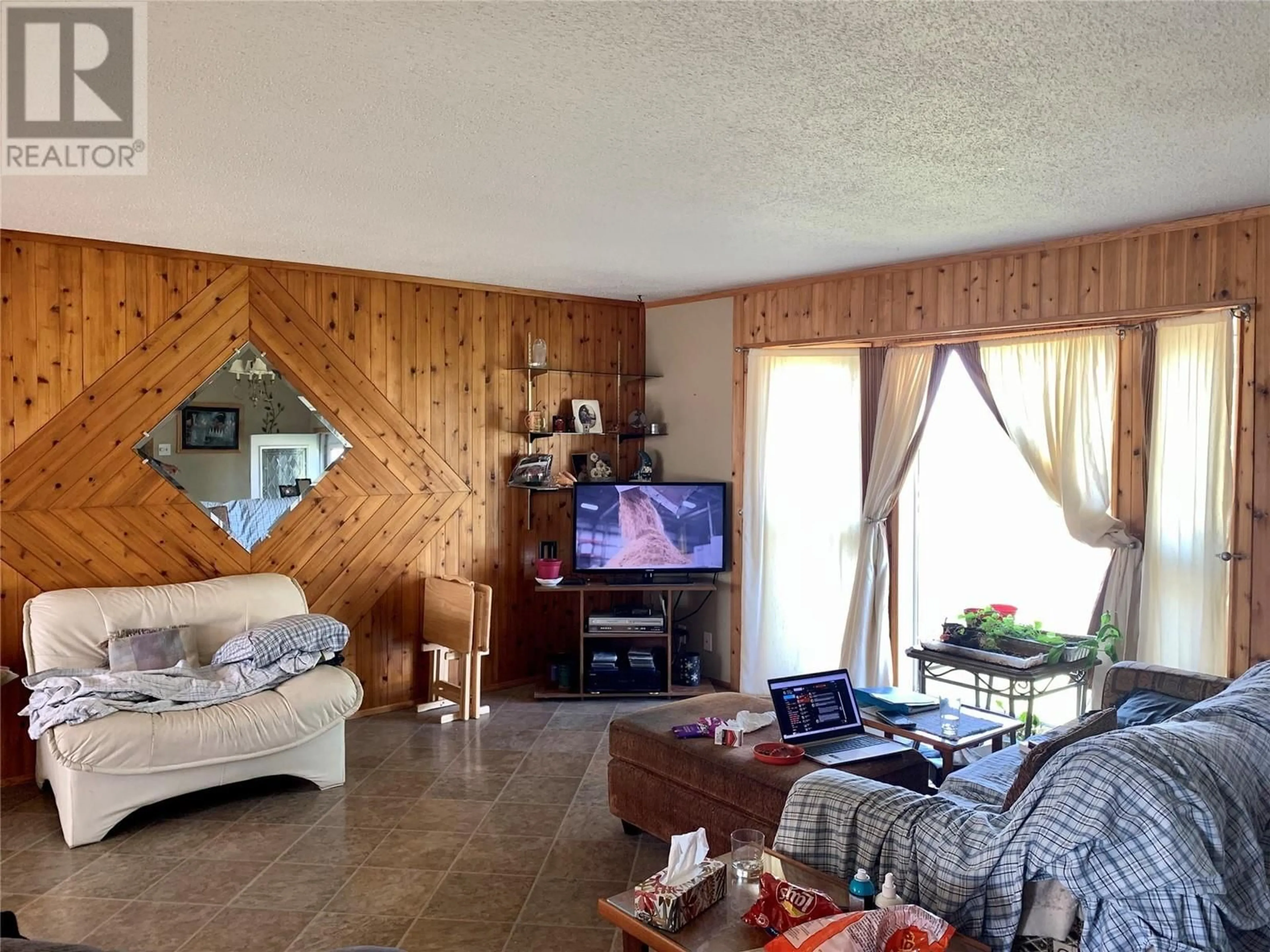 Living room with furniture, unknown for 9112 CALVERLEY CRESCENT, Dawson Creek British Columbia V1G2R2