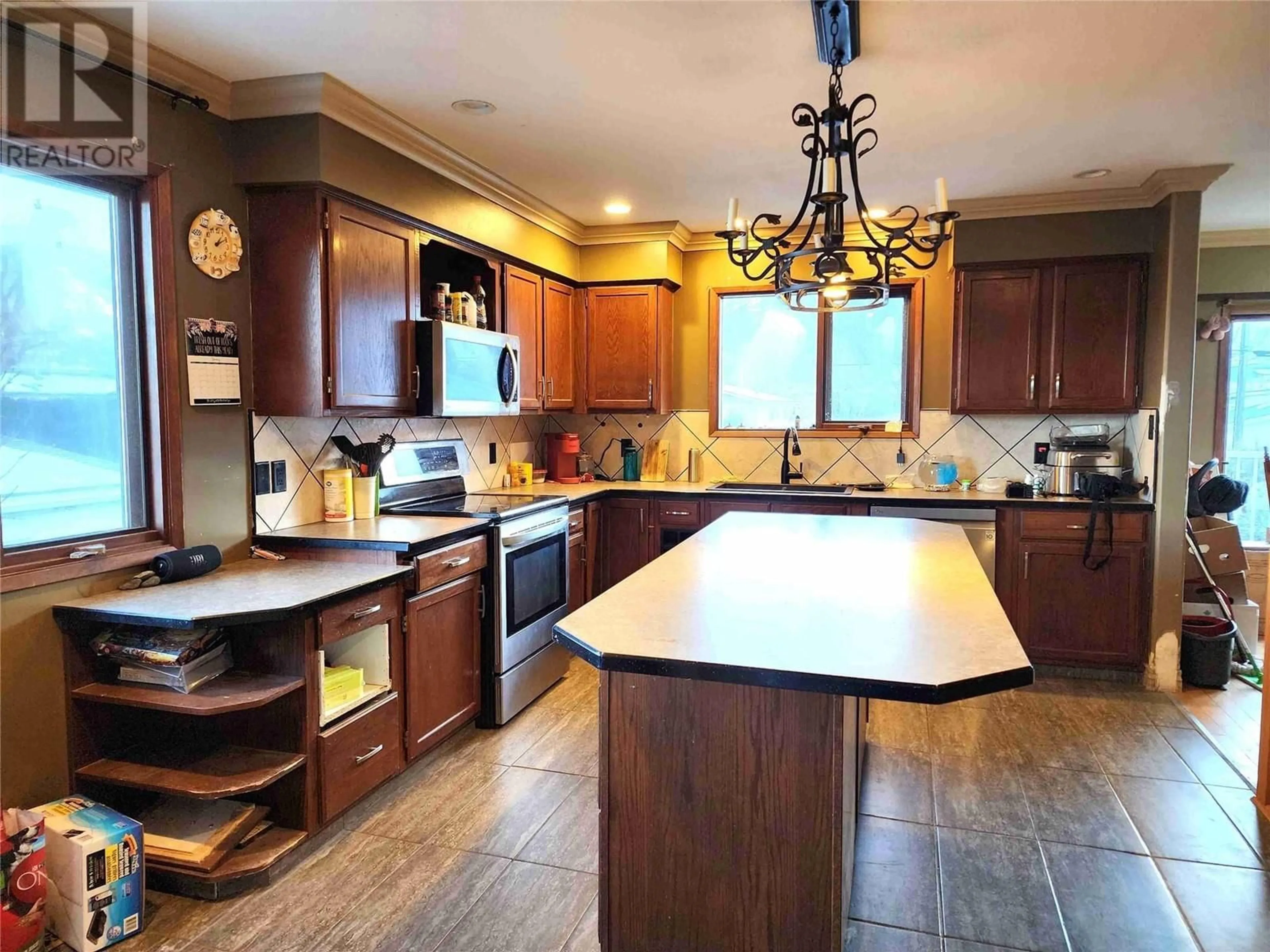 Open concept kitchen, ceramic/tile floor for 1408 SPRUCE AVENUE, Merritt British Columbia V1K1L2