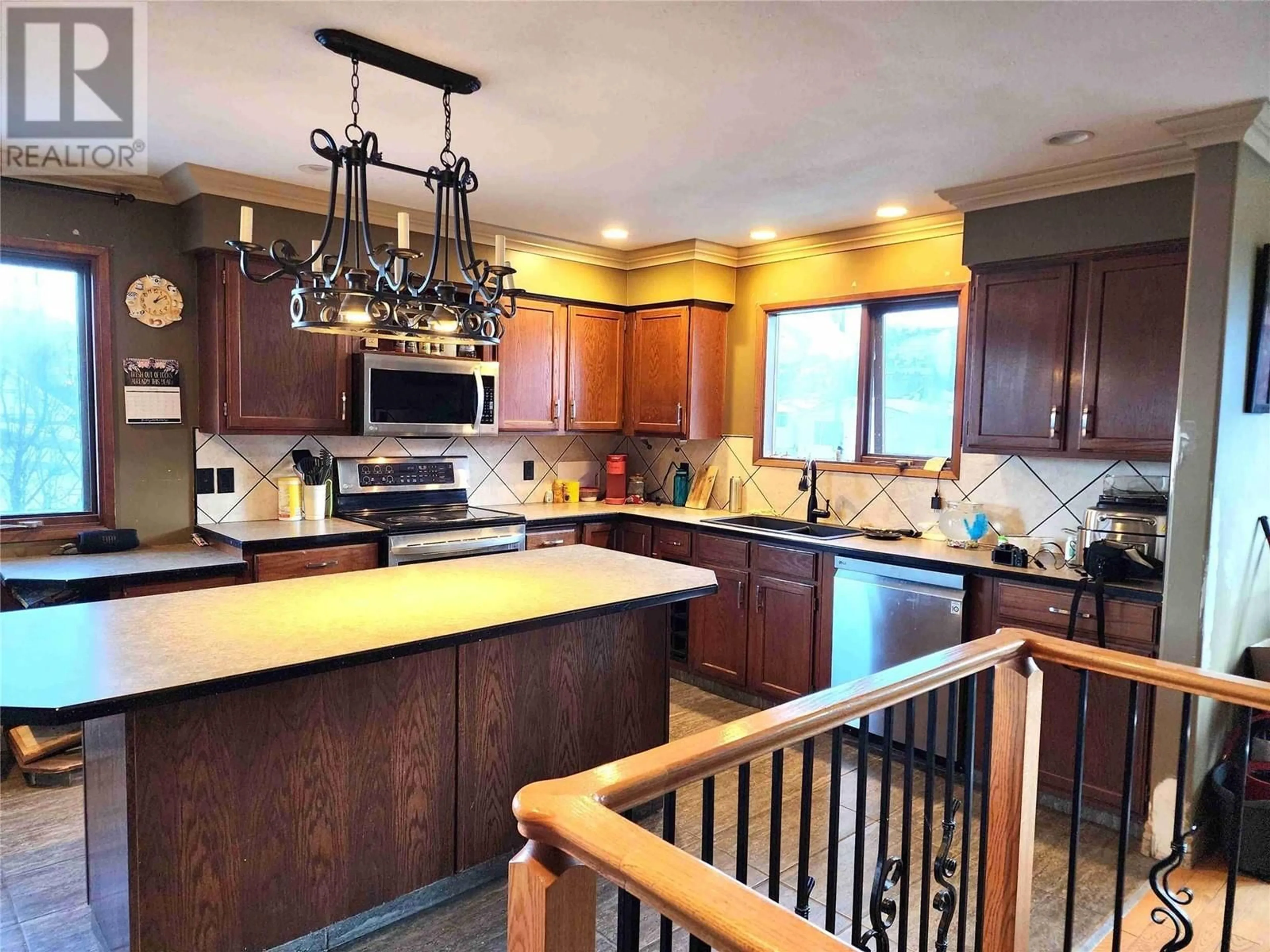 Open concept kitchen, unknown for 1408 Spruce Avenue, Merritt British Columbia V1K1L2