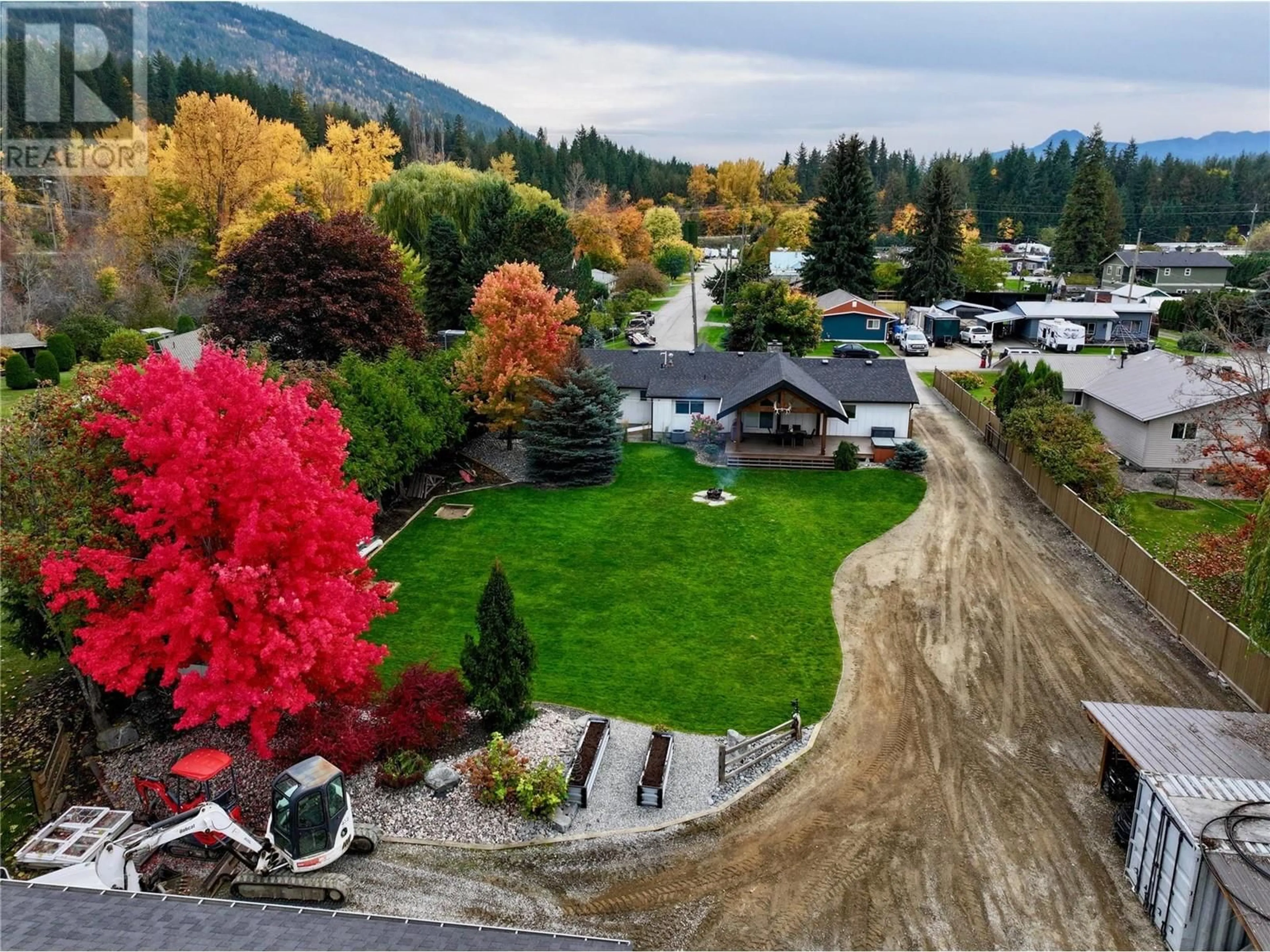 A pic from outside/outdoor area/front of a property/back of a property/a pic from drone, mountain view for 5421 71 Avenue NE, Salmon Arm British Columbia V0E1K0