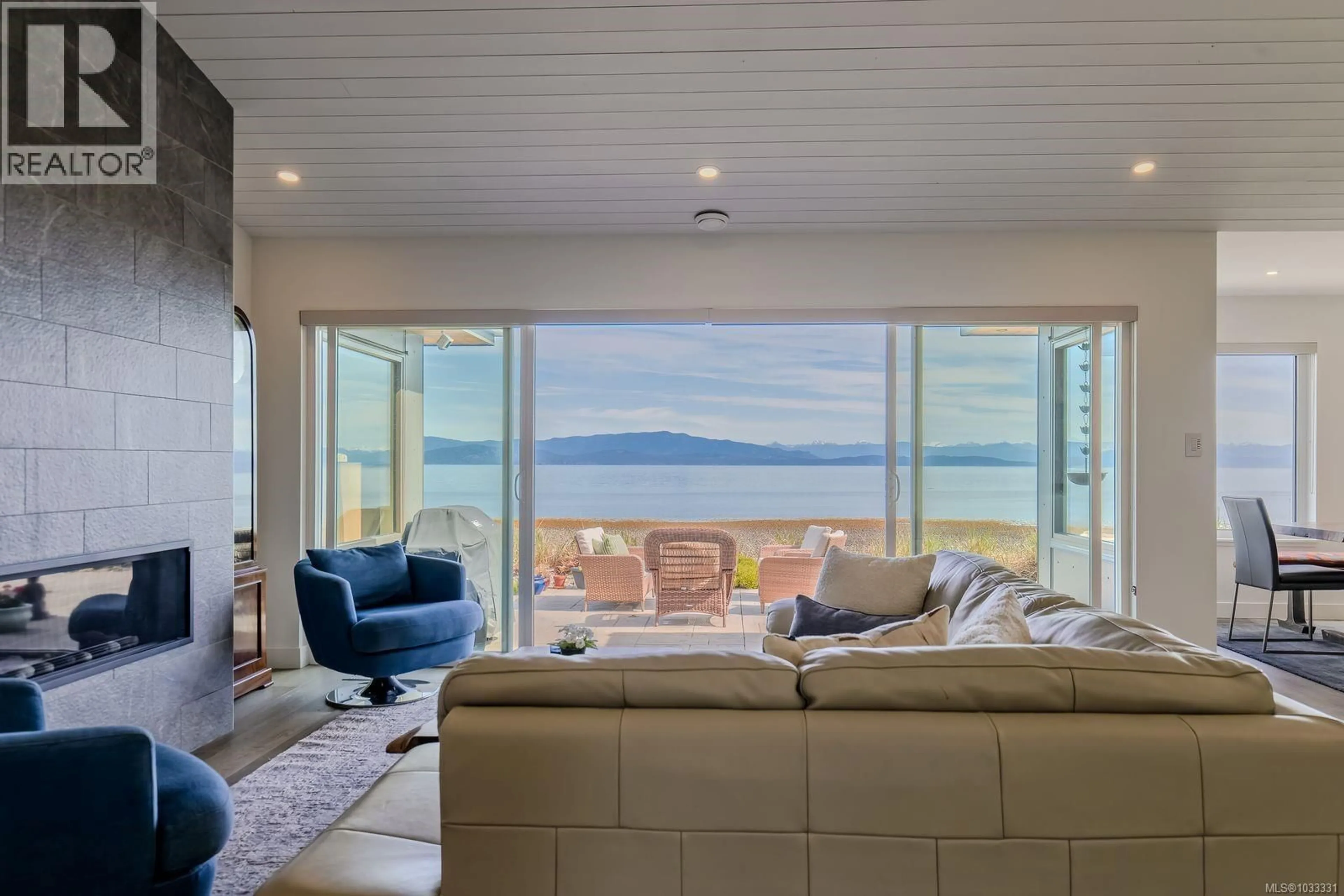 Living room with furniture, unknown for 1701 ADMIRAL TRYON BOULEVARD, French Creek British Columbia V9P1Y1