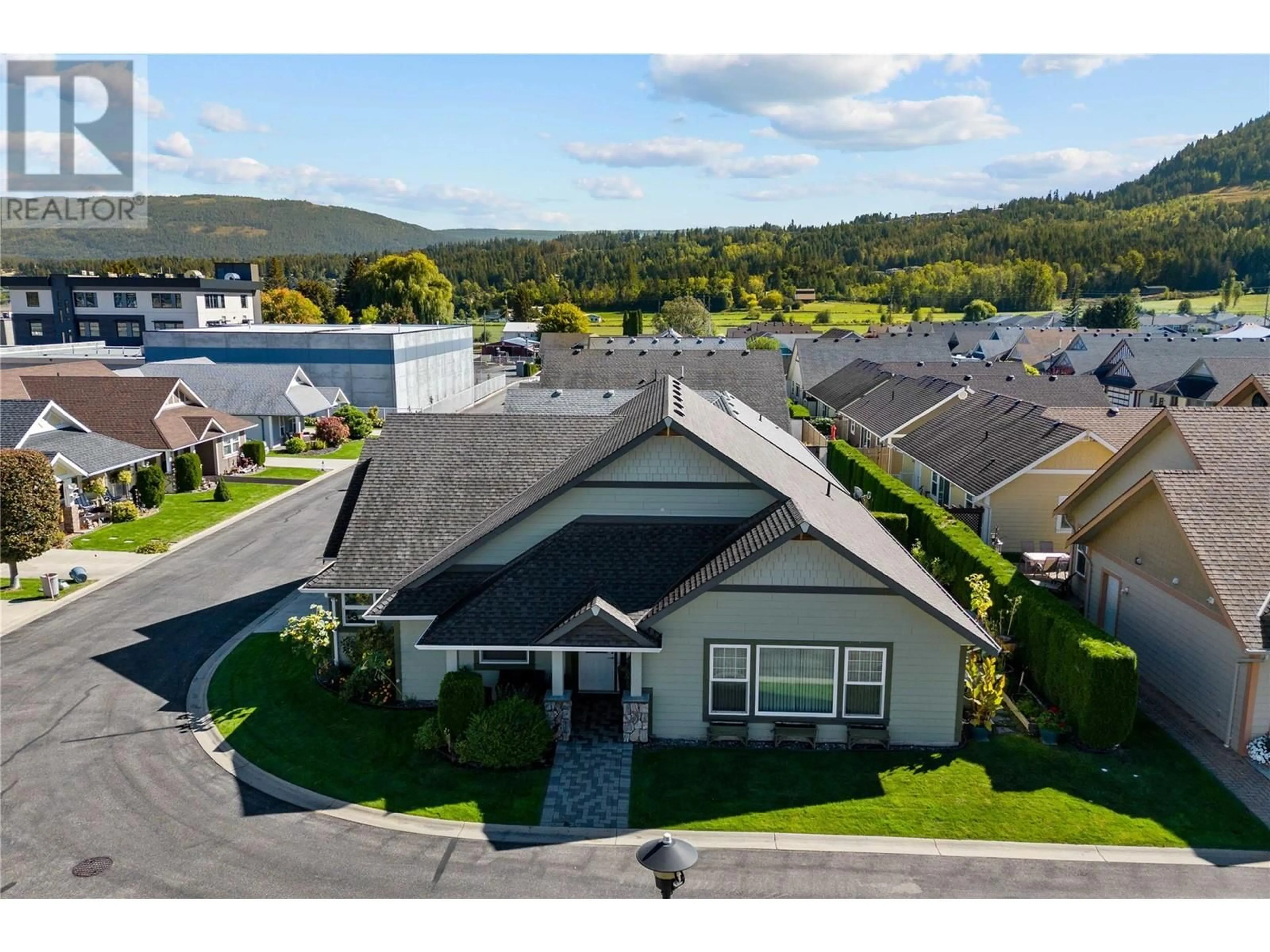 A pic from outside/outdoor area/front of a property/back of a property/a pic from drone, mountain view for 38 - 1231 10 STREET SOUTHWEST, Salmon Arm British Columbia V1E0A5