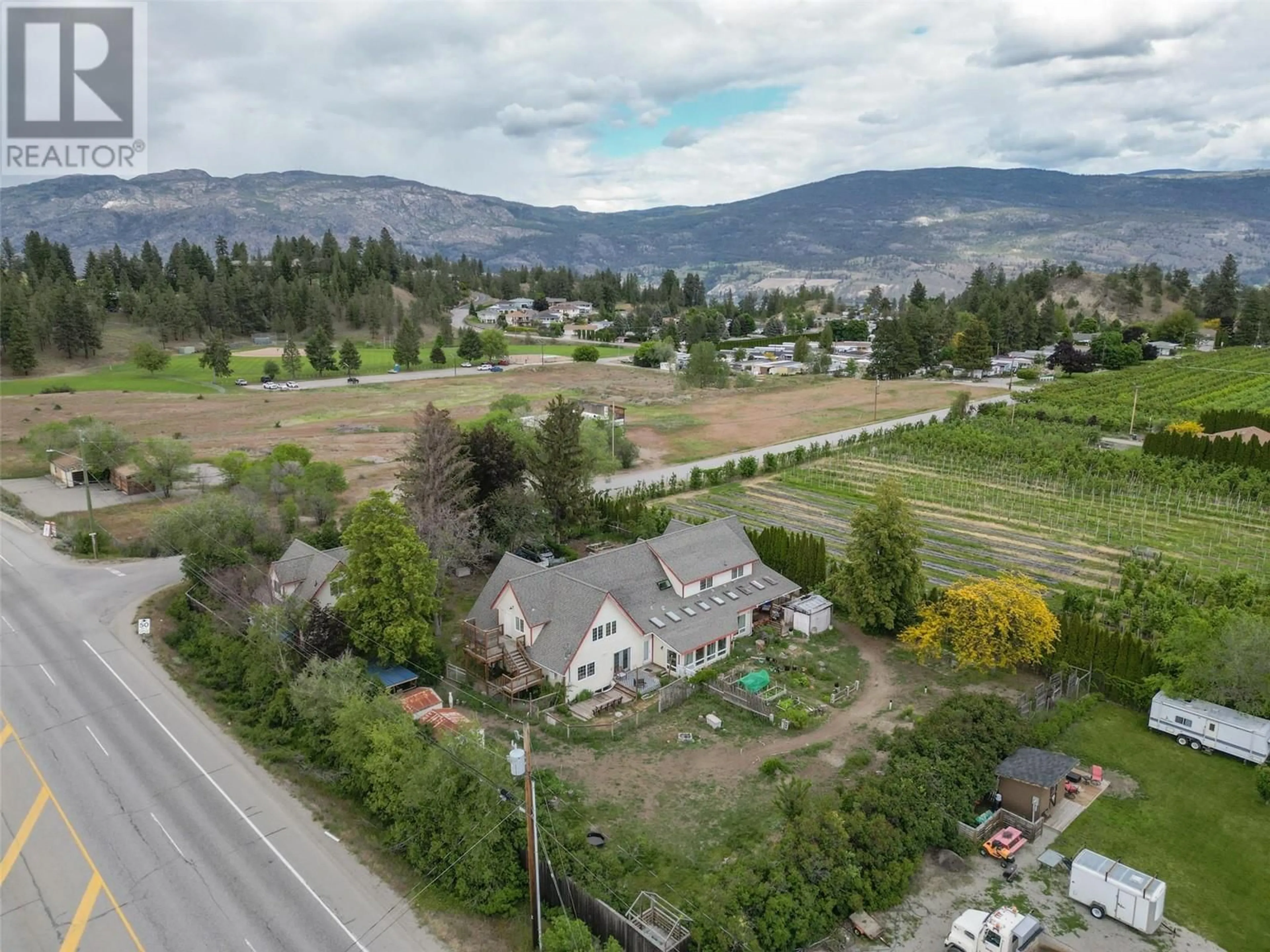 A pic from outside/outdoor area/front of a property/back of a property/a pic from drone, mountain view for 9509 Steuart Street, Summerland British Columbia V0H1Z6