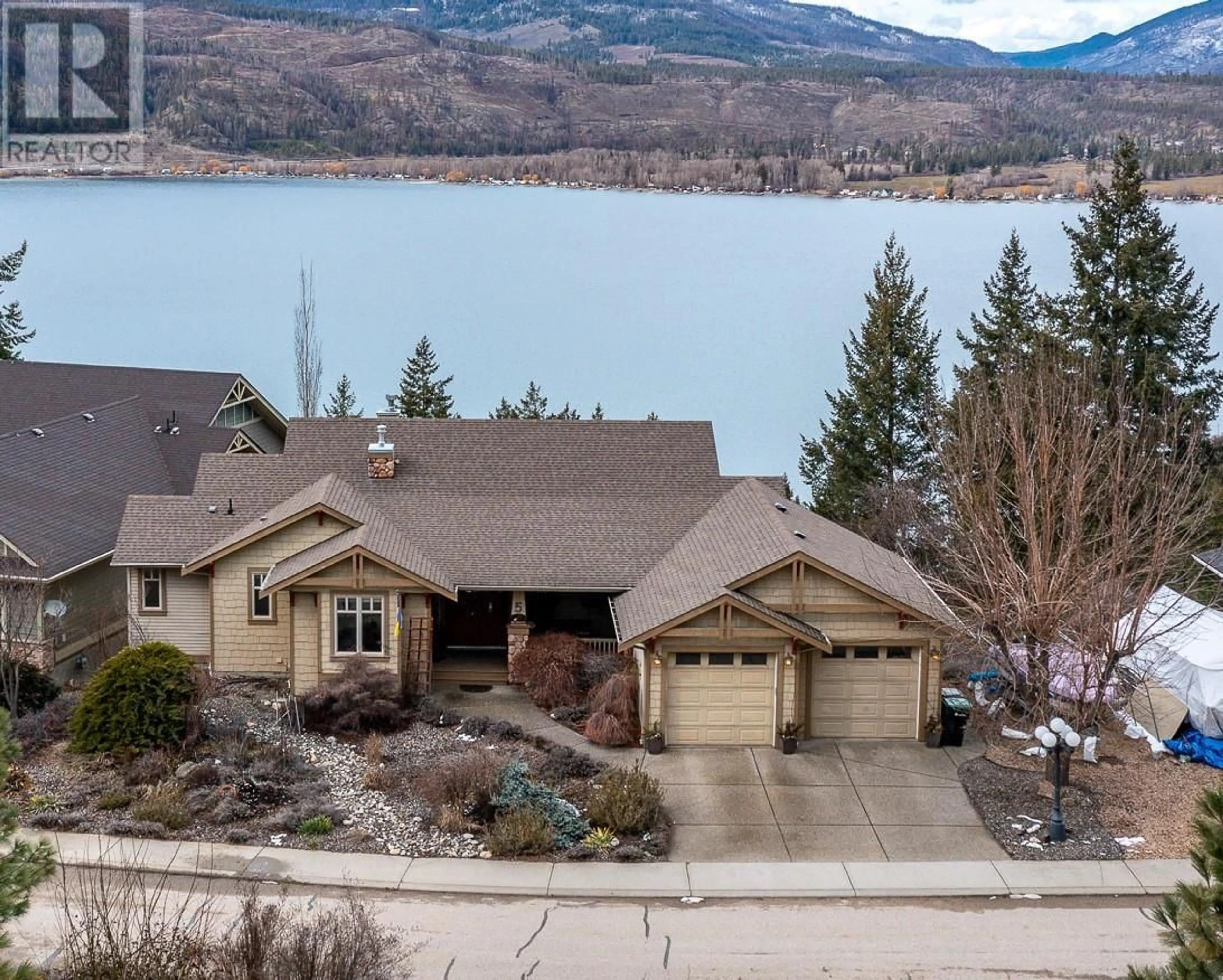 A pic from outside/outdoor area/front of a property/back of a property/a pic from drone, water/lake/river/ocean view for 40 Kestrel Place Unit# 5, Vernon British Columbia V1H1S6