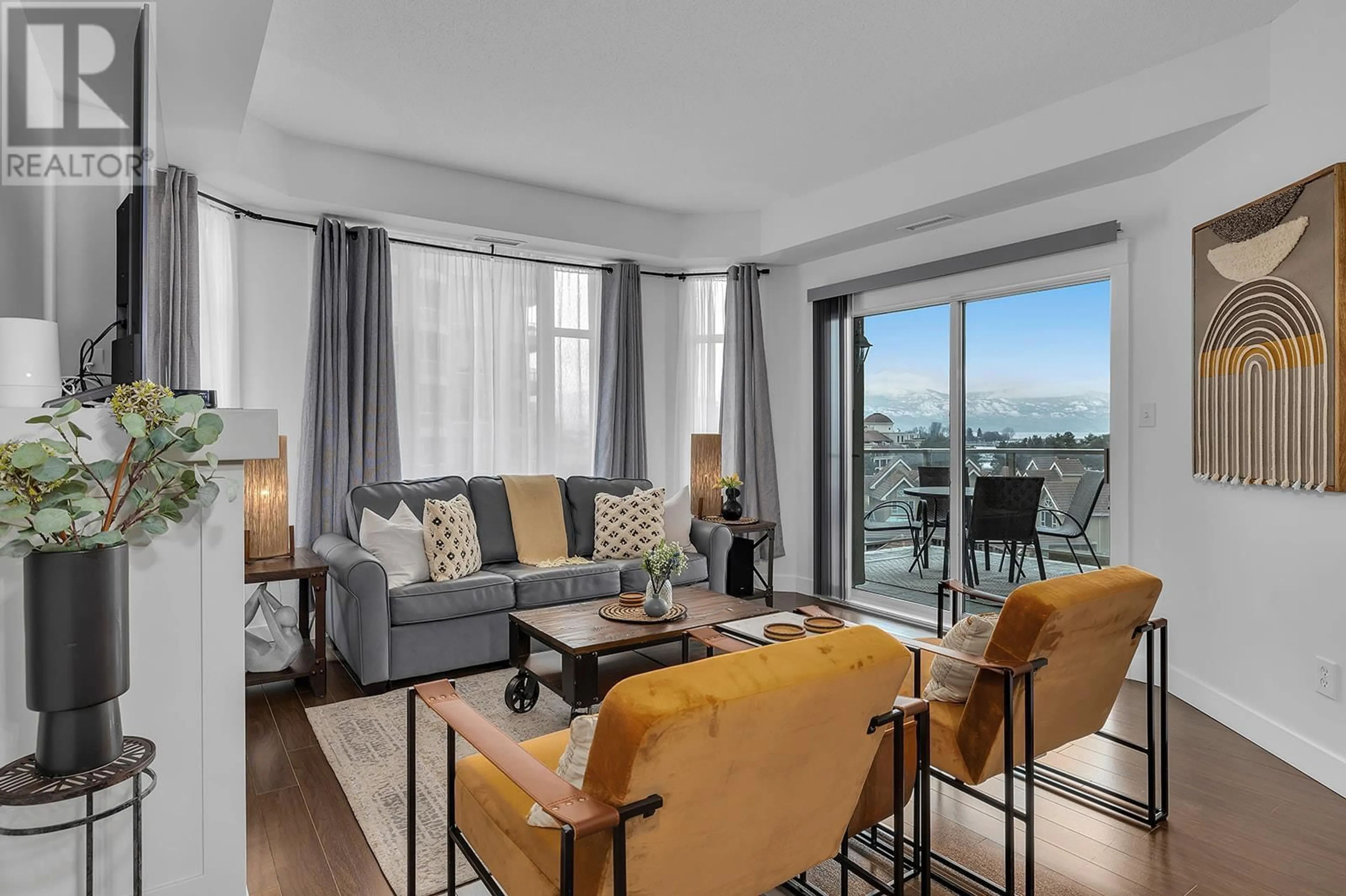 Living room with furniture, unknown for 702 - 1128 SUNSET DRIVE, Kelowna British Columbia V1Y9W7