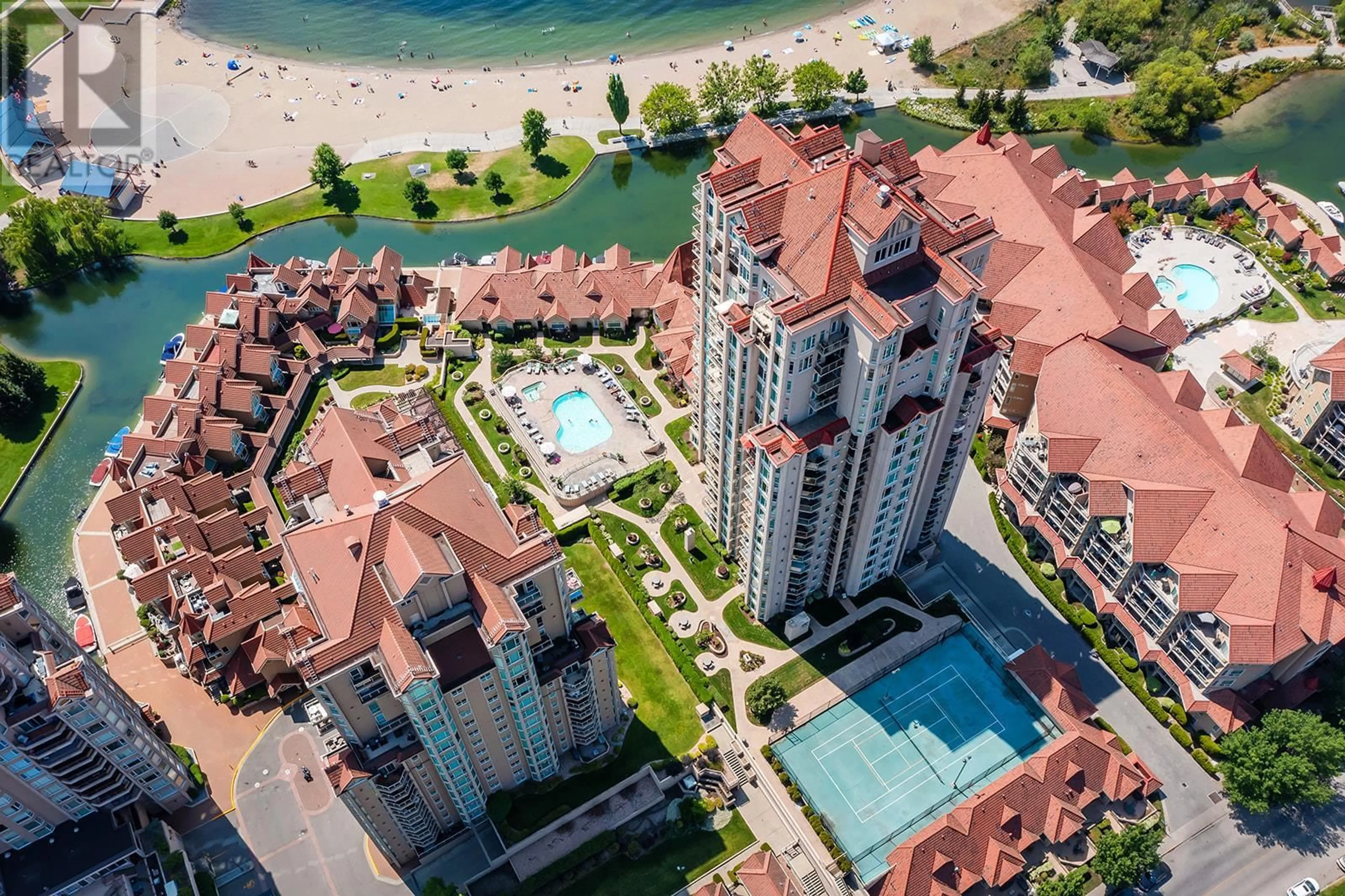 A pic from outside/outdoor area/front of a property/back of a property/a pic from drone, water/lake/river/ocean view for 702 - 1128 SUNSET DRIVE, Kelowna British Columbia V1Y9W7