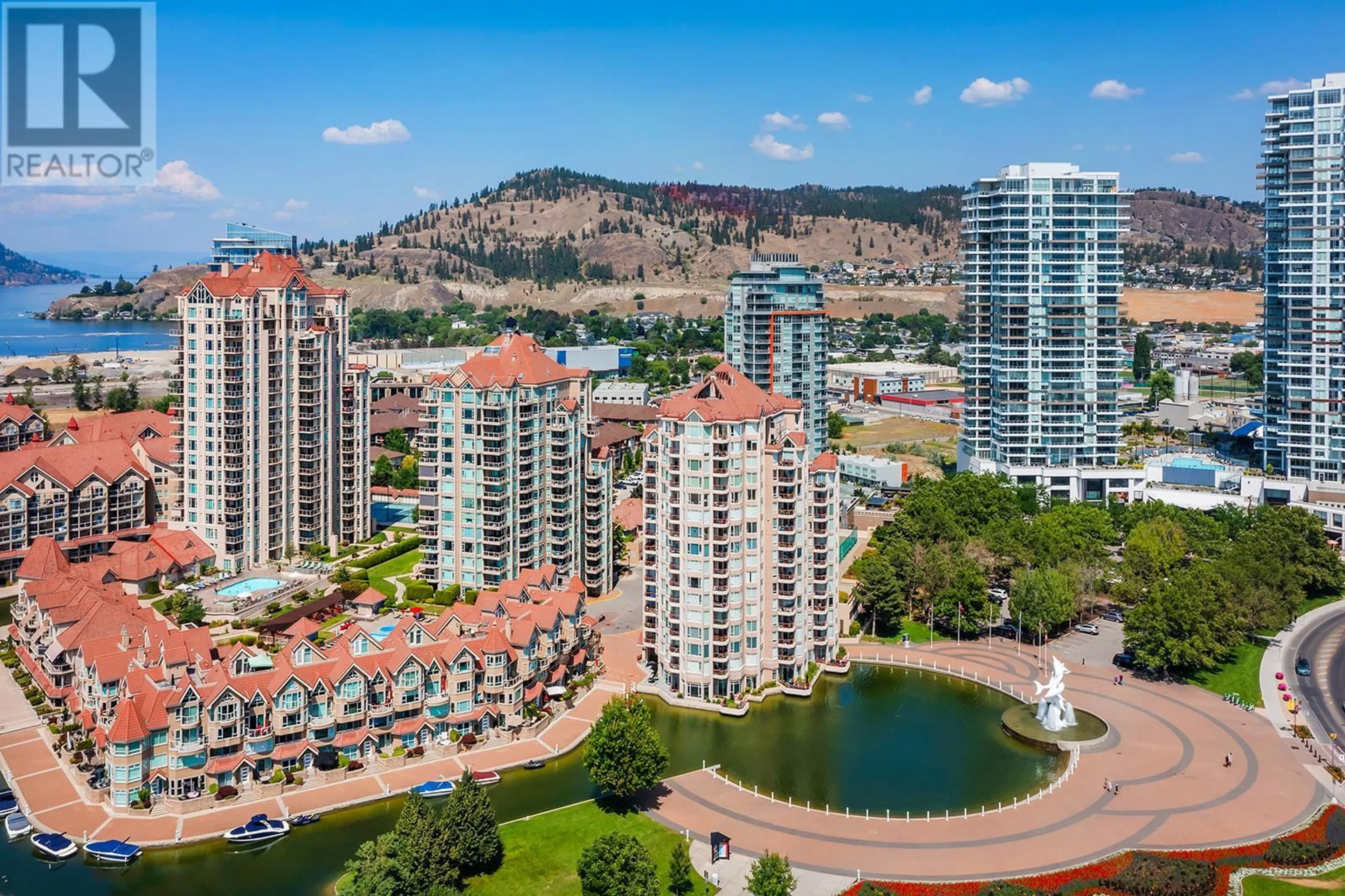 A pic from outside/outdoor area/front of a property/back of a property/a pic from drone, city buildings view from balcony for 702 - 1128 SUNSET DRIVE, Kelowna British Columbia V1Y9W7
