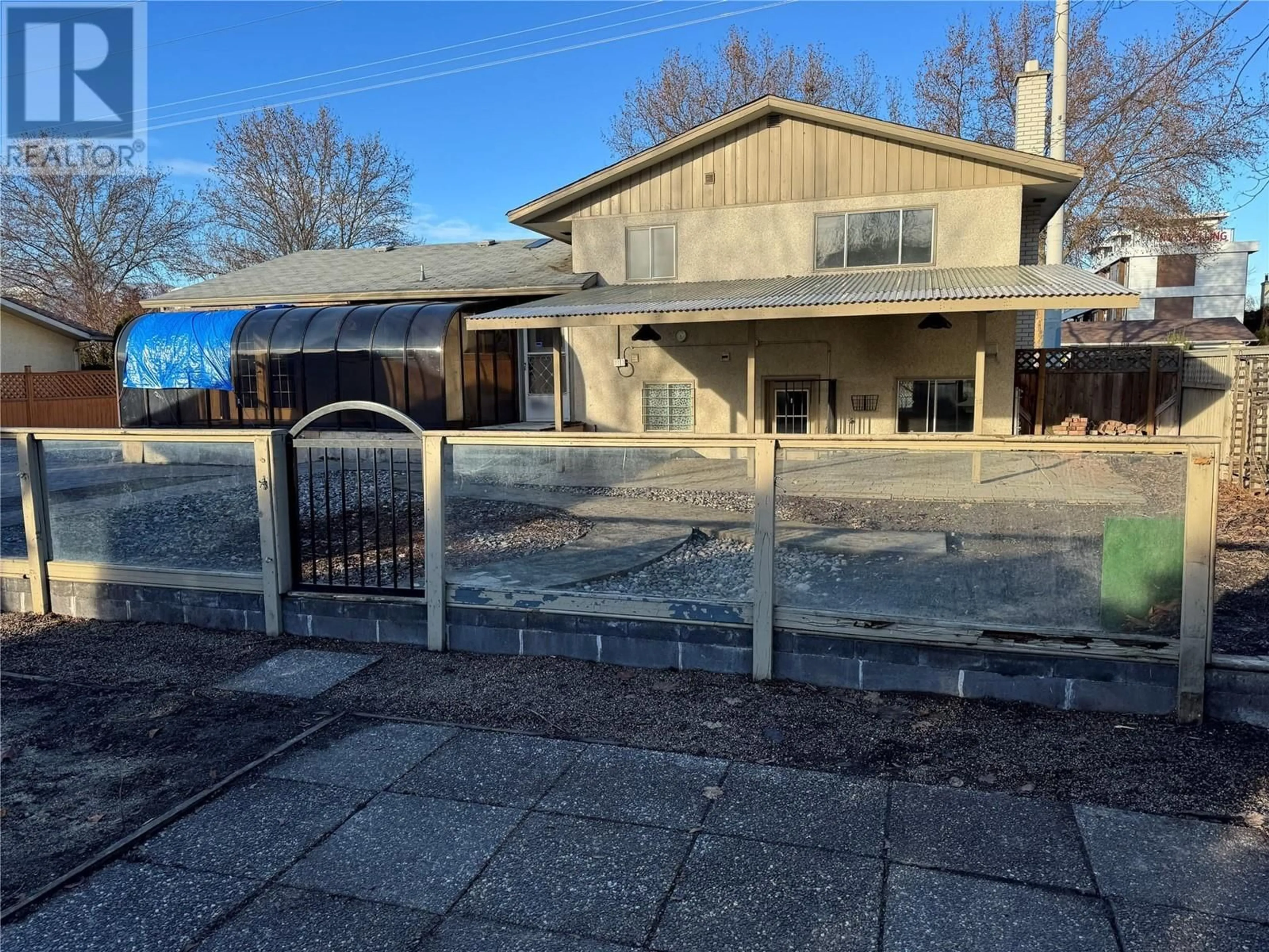 A pic from outside/outdoor area/front of a property/back of a property/a pic from drone, unknown for 1441 Springfield Road, Kelowna British Columbia V1Y5V2