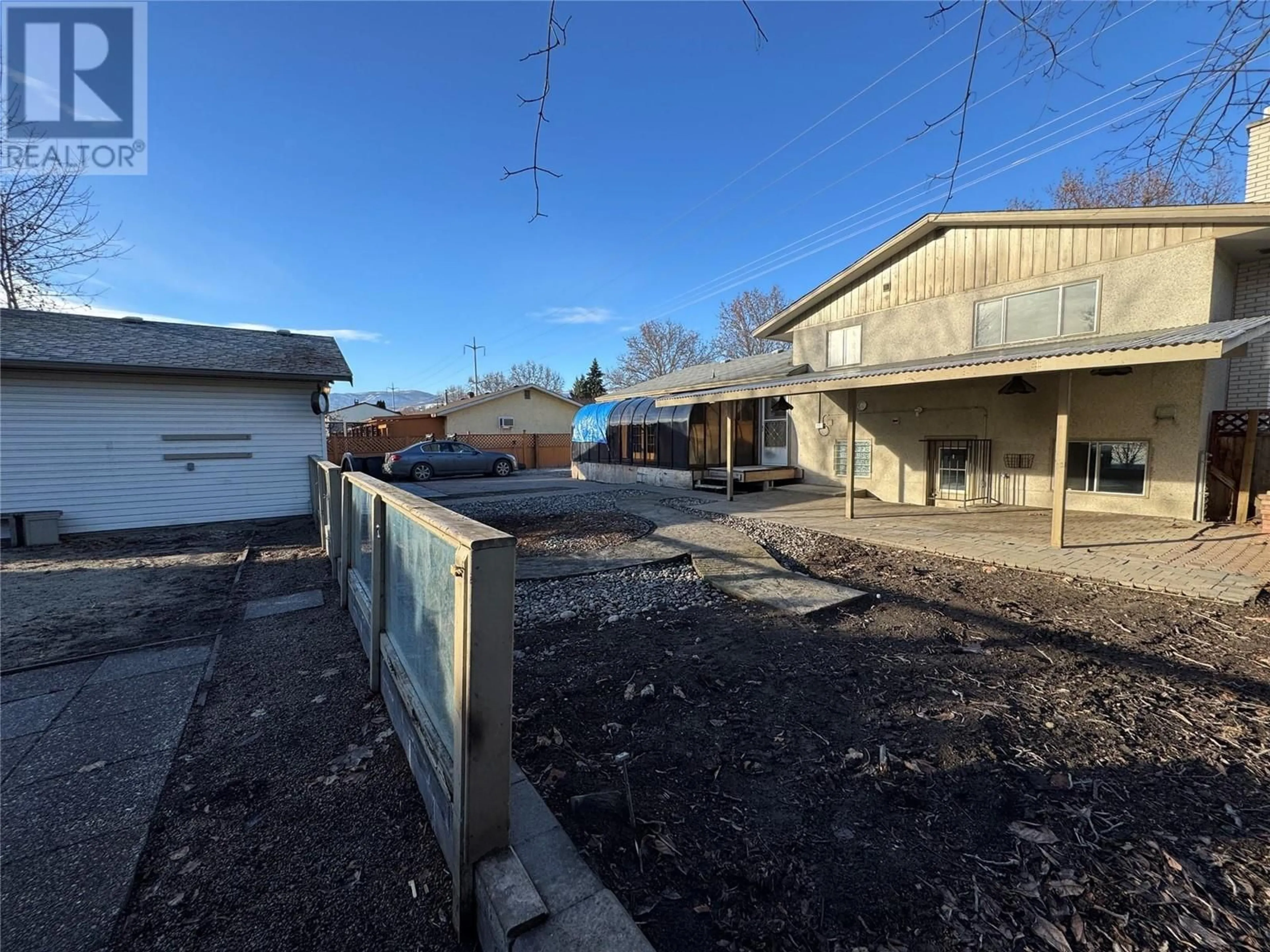 A pic from outside/outdoor area/front of a property/back of a property/a pic from drone, building for 1441 Springfield Road, Kelowna British Columbia V1Y5V2