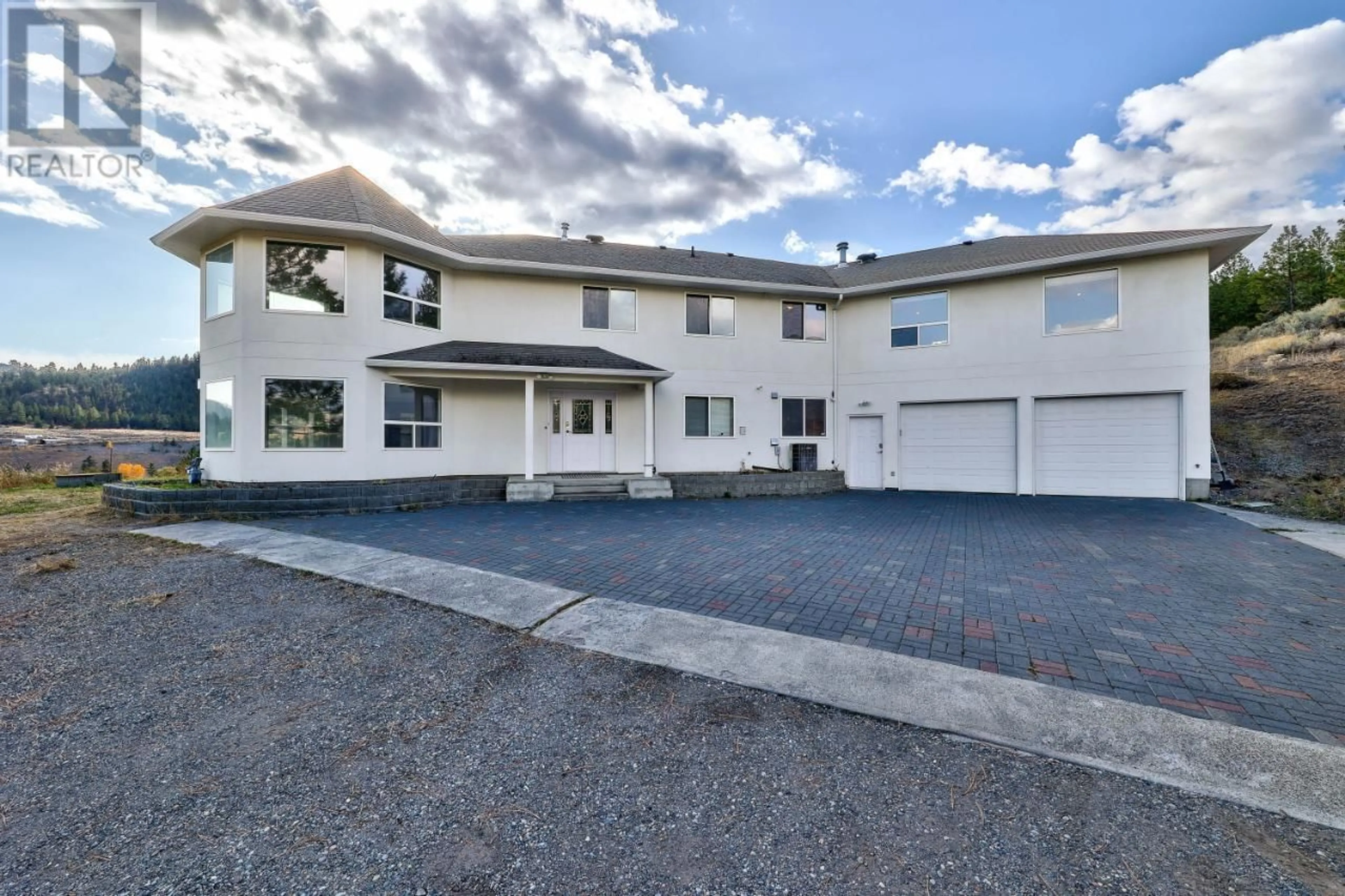 A pic from outside/outdoor area/front of a property/back of a property/a pic from drone, street for 7035 BLACKWELL Road, Kamloops British Columbia V2H1T7