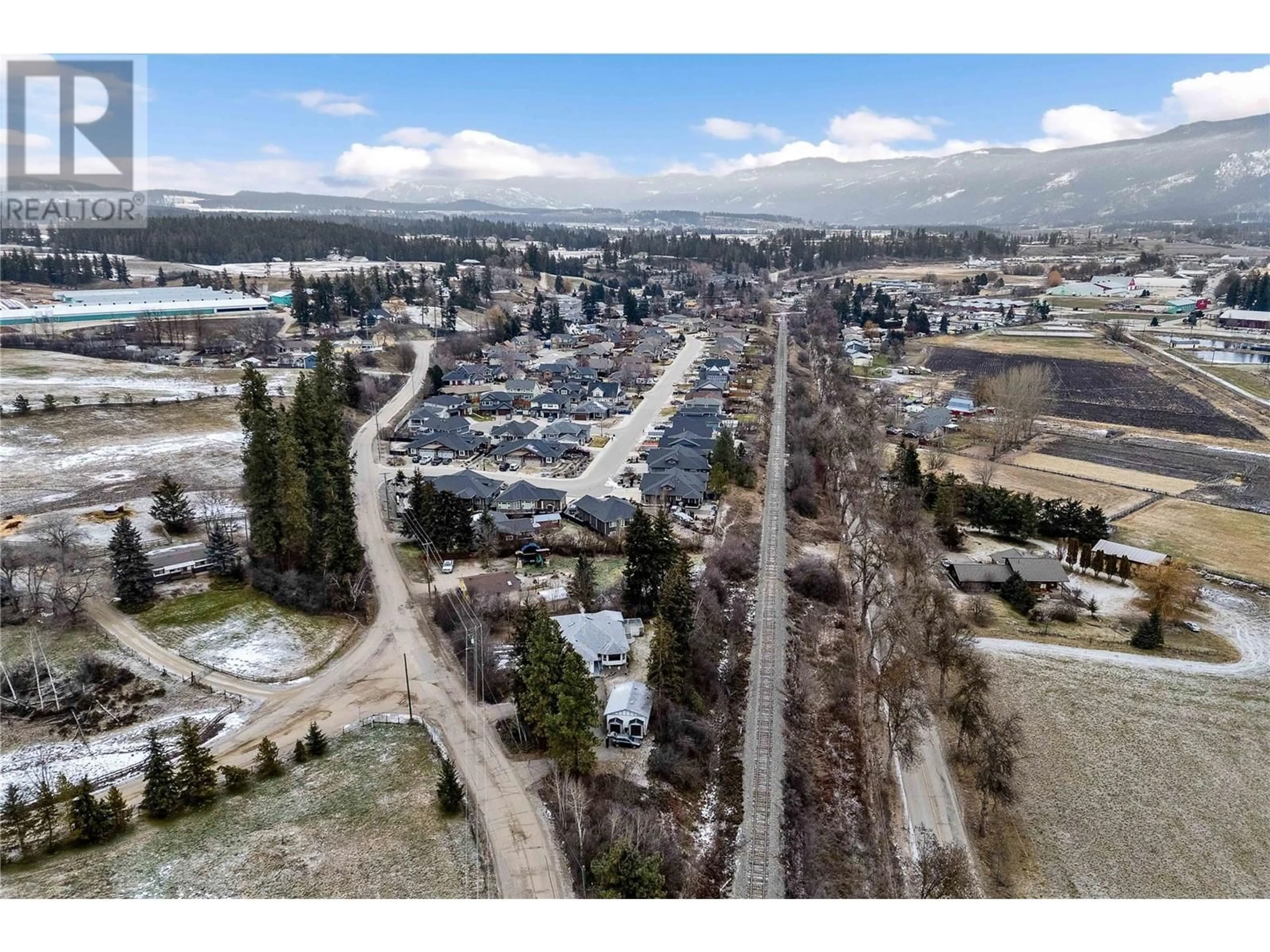 A pic from outside/outdoor area/front of a property/back of a property/a pic from drone, mountain view for 3170 FRASER ROAD, Armstrong British Columbia V0E1B4