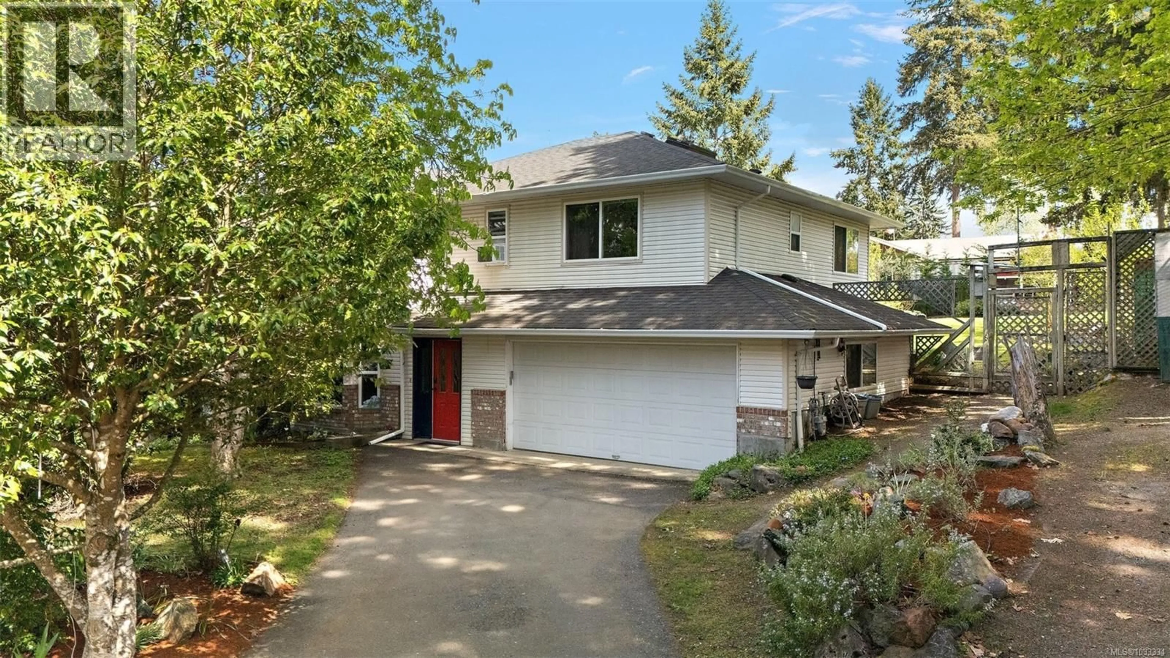 Home with vinyl exterior material, street for 6419 WICKS ROAD, Duncan British Columbia V9L5V3