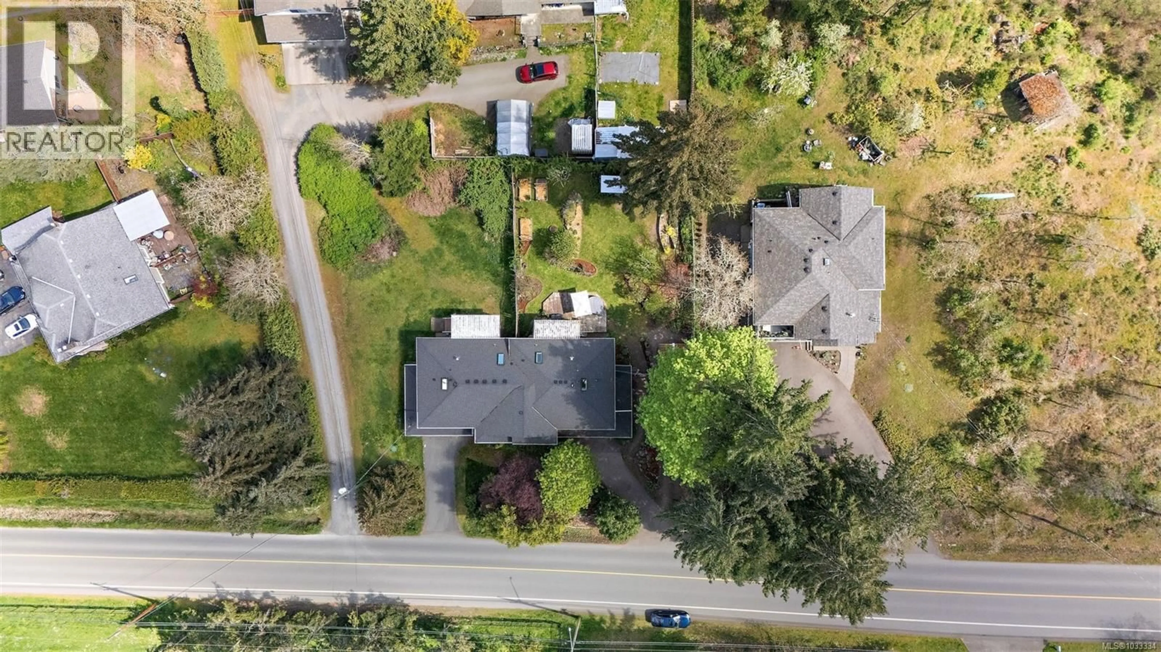 A pic from outside/outdoor area/front of a property/back of a property/a pic from drone, street for 6419 WICKS ROAD, Duncan British Columbia V9L5V3