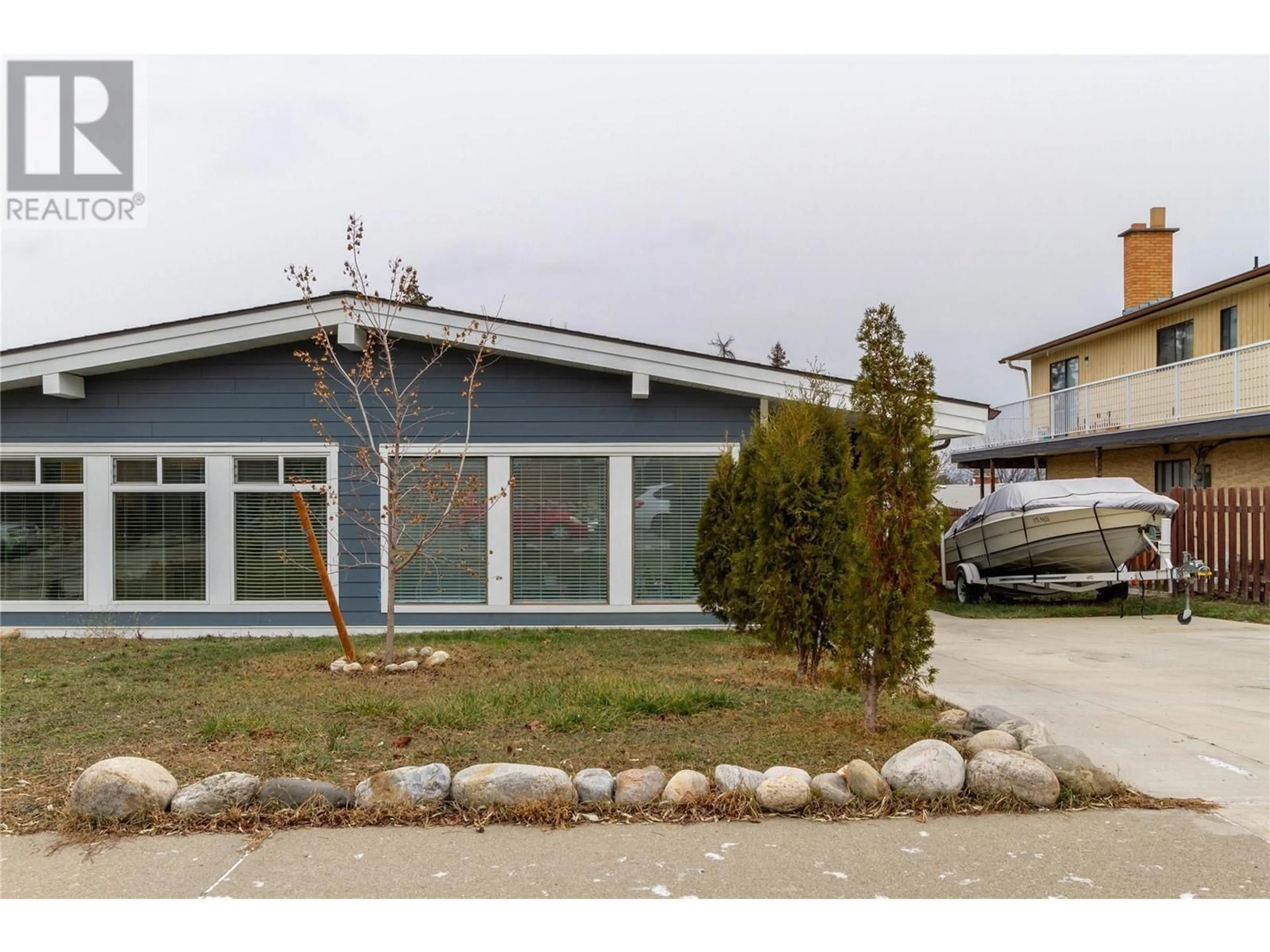 Home with vinyl exterior material, street for 3605 Commonage Crescent, Vernon British Columbia V1T8M4